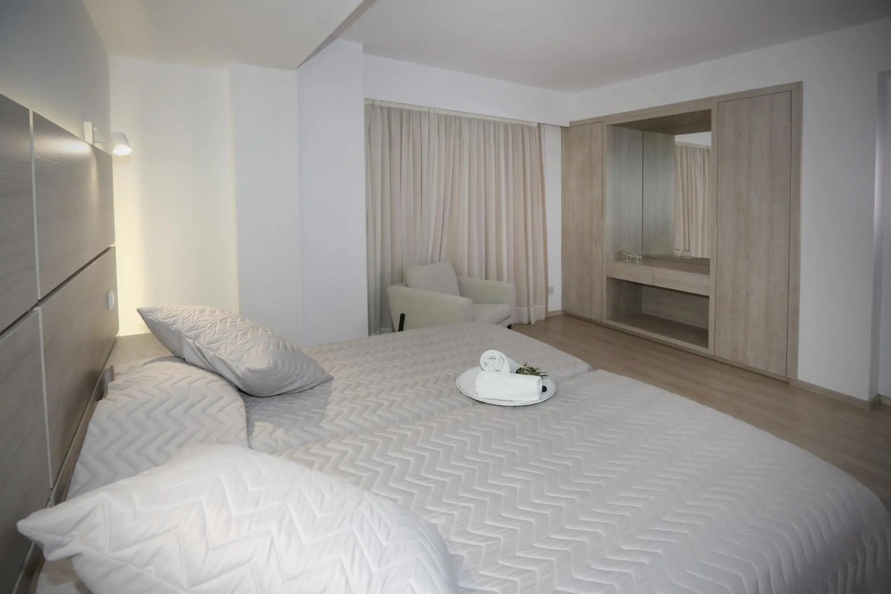 Bed in Pier Beach Hotel Apartments Bed in Pier Beach Hotel Apartments