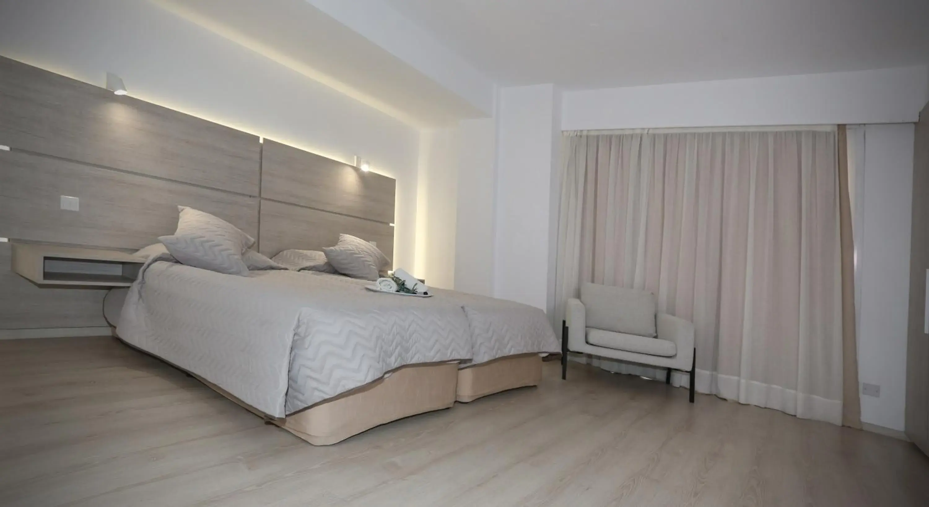 Bed in Pier Beach Hotel Apartments Bed in Pier Beach Hotel Apartments