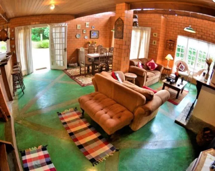 Communal lounge/ TV room in Pousada das Montanhas