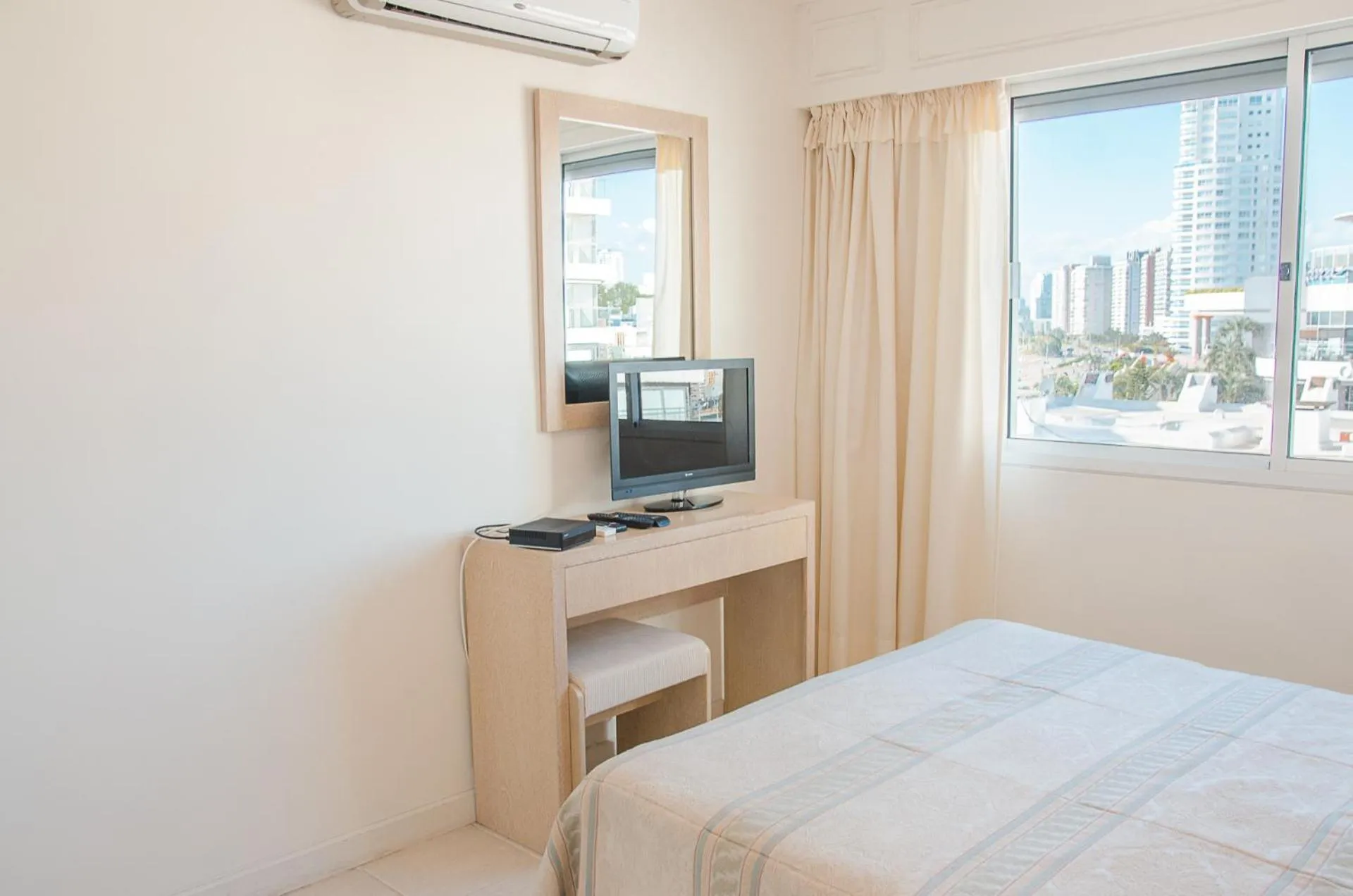 Bed in Hotel Sunset Beach