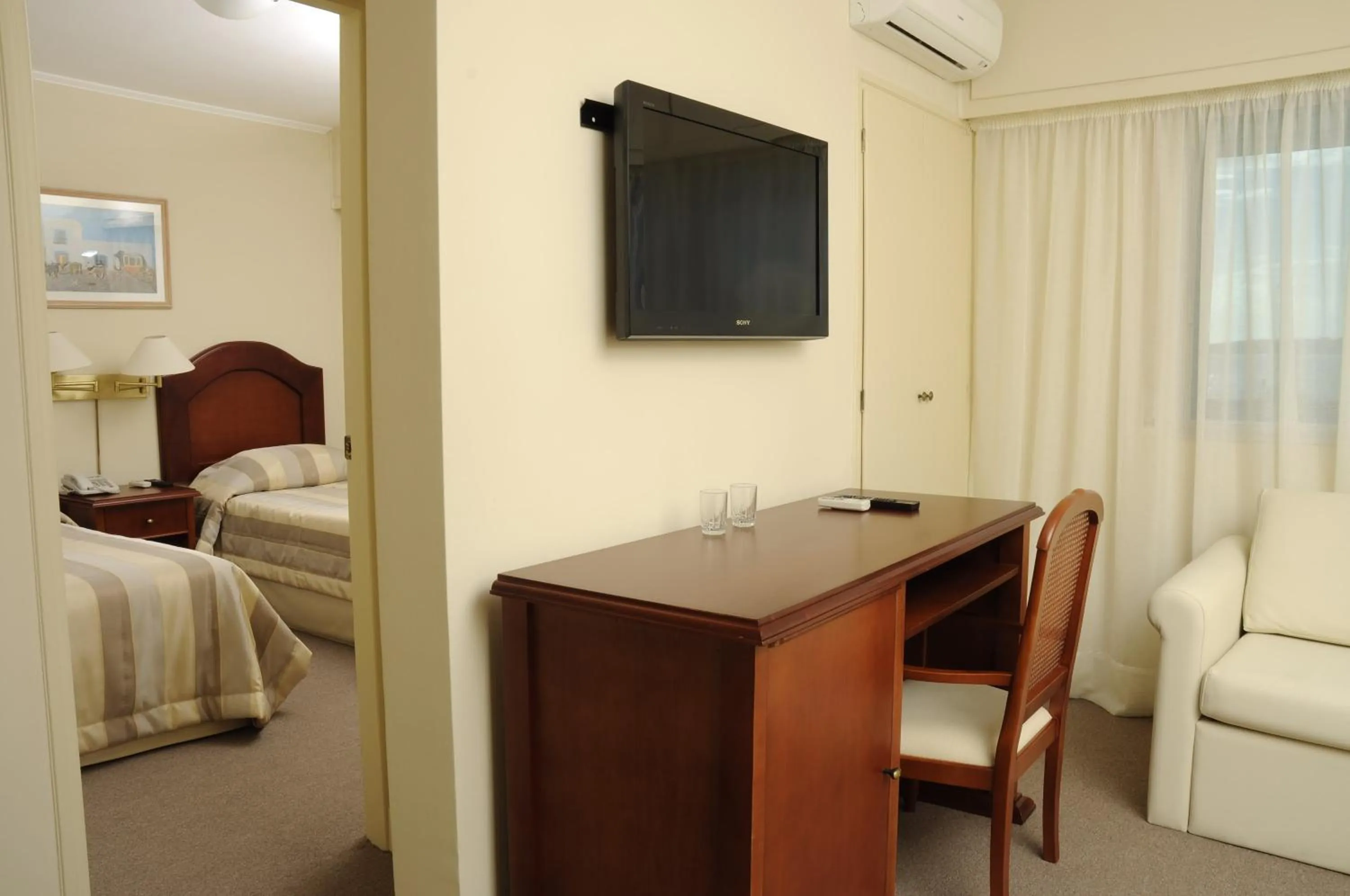 Living room, Bed in Hotel Sunset Beach