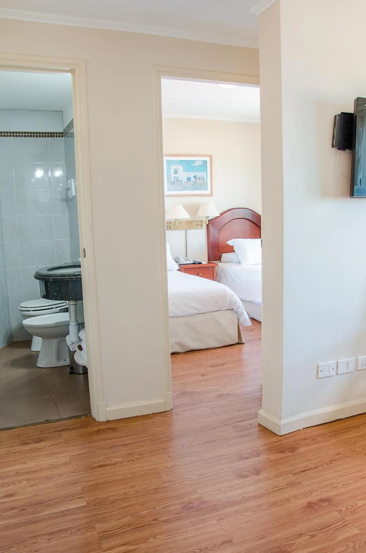 Bed in Hotel Sunset Beach