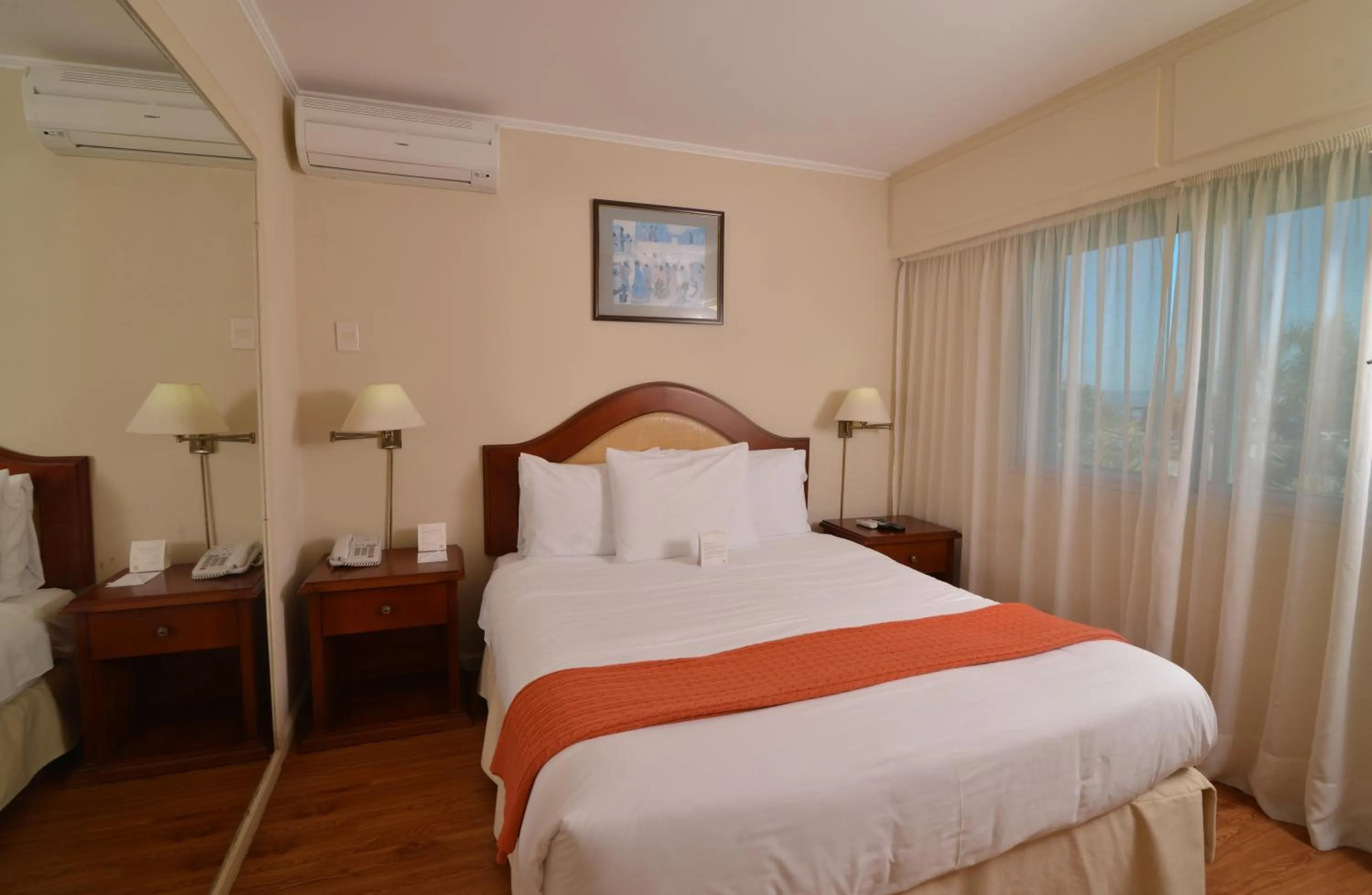 Bed in Hotel Sunset Beach