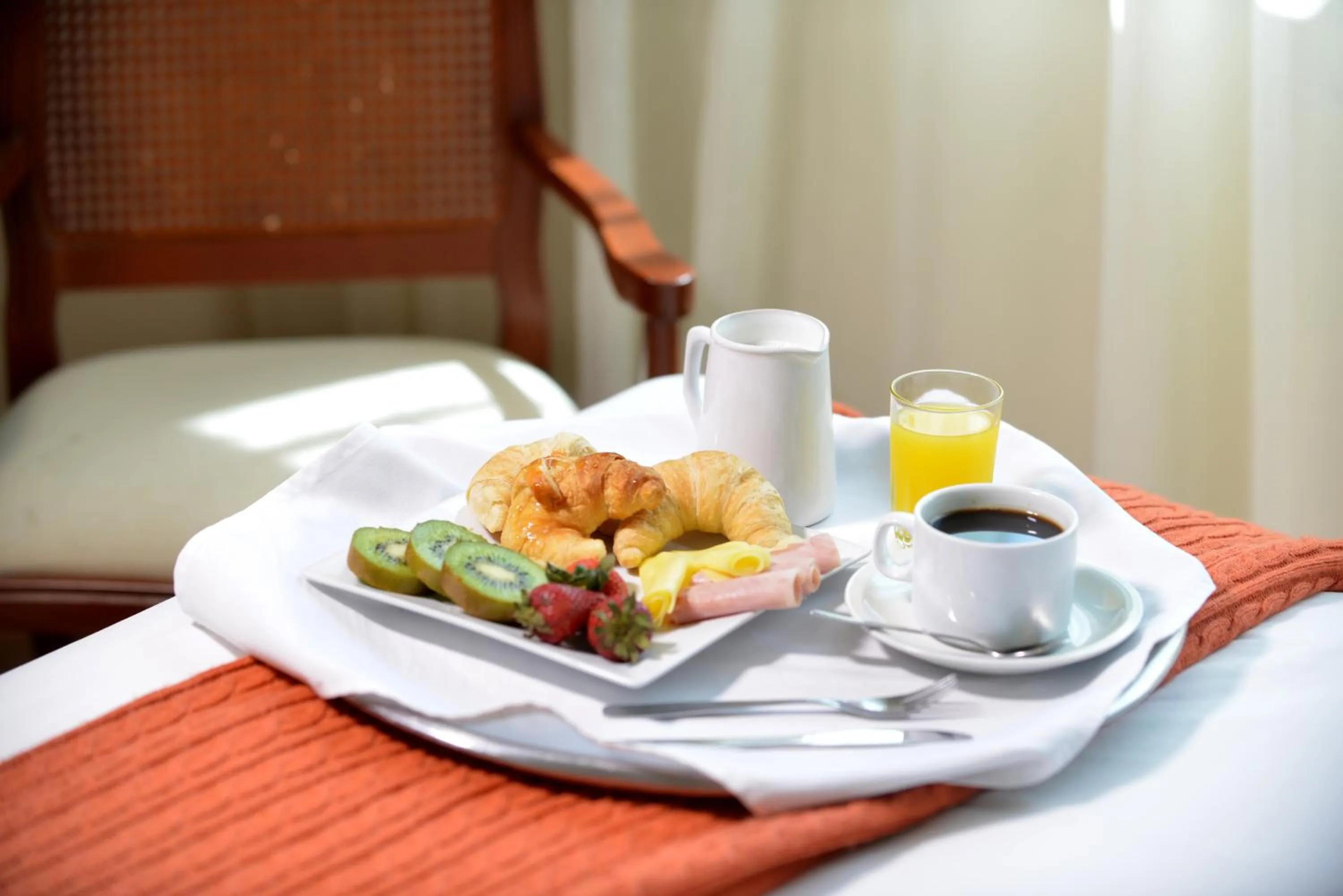 Bed in Hotel Sunset Beach