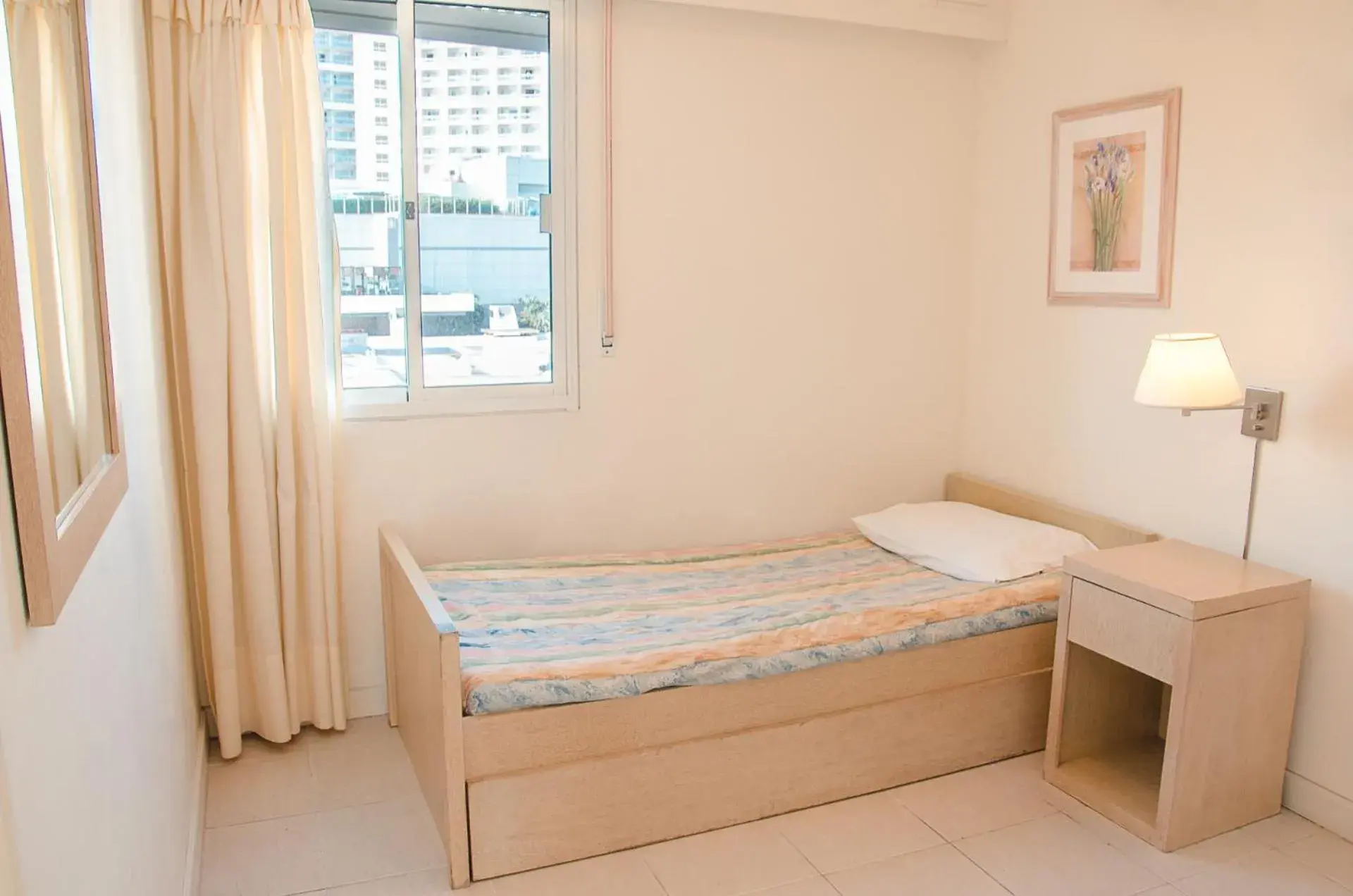 Bed in Hotel Sunset Beach Bed in Hotel Sunset Beach