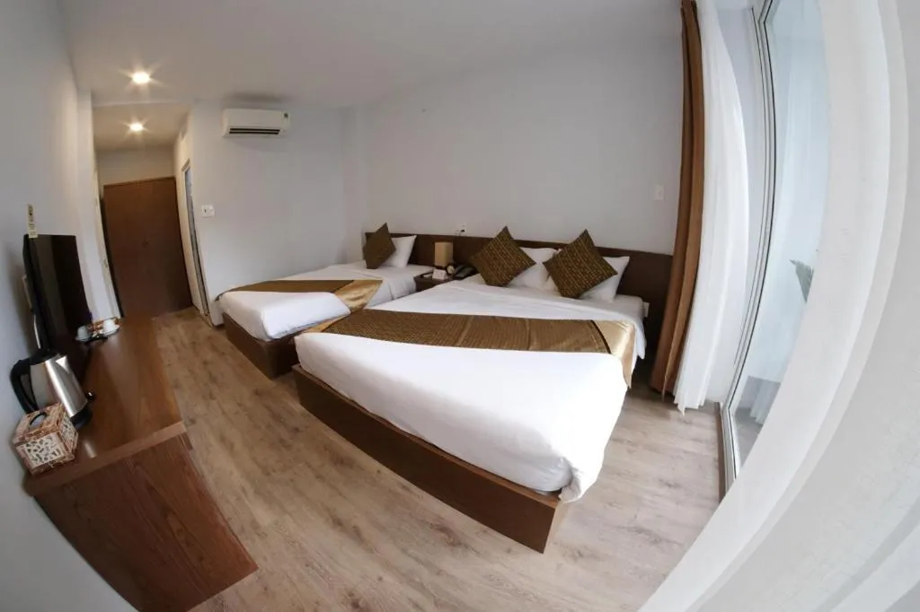 Bed in The Umi Hotel