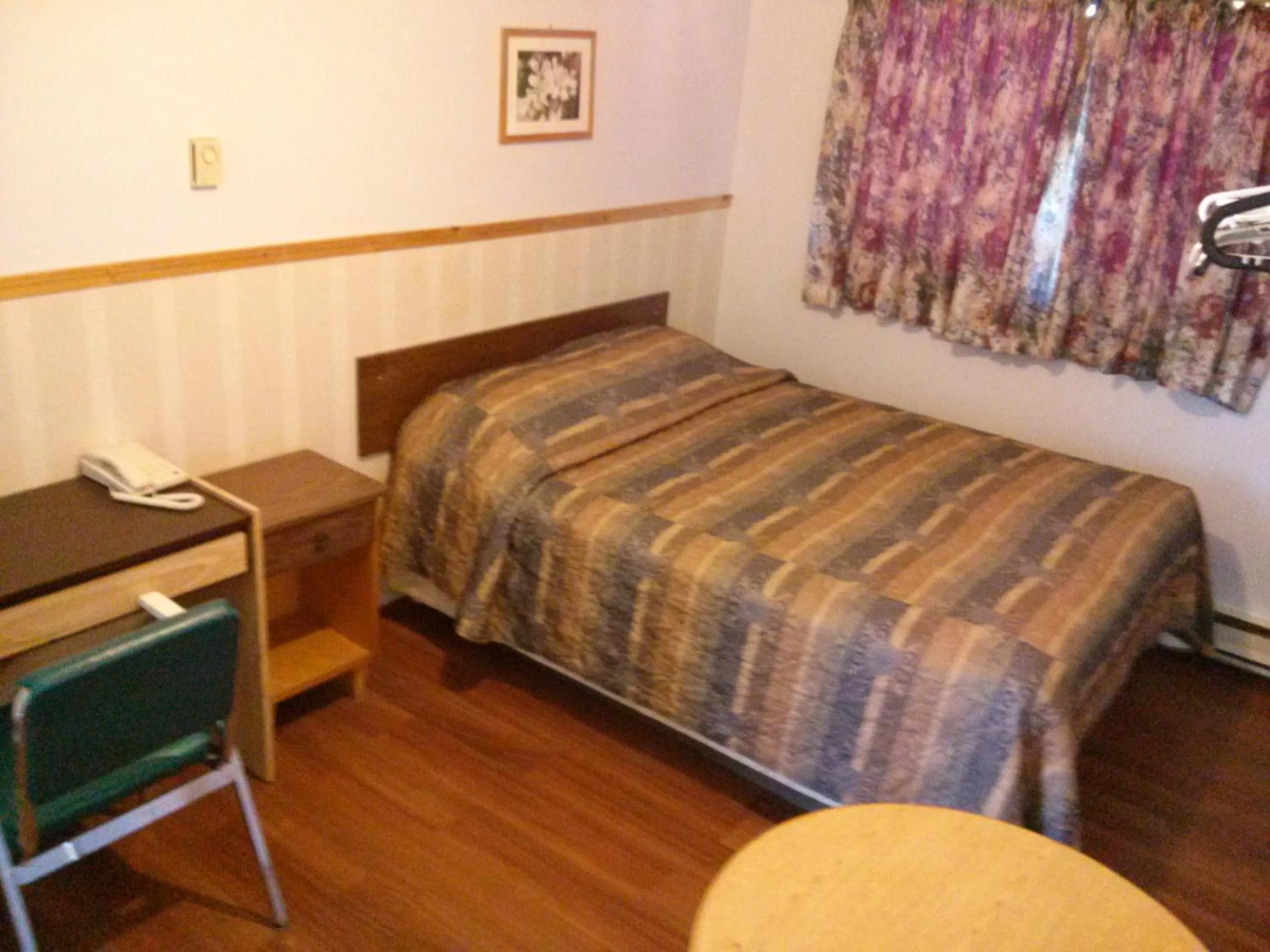 Bed in Moosomin Motel