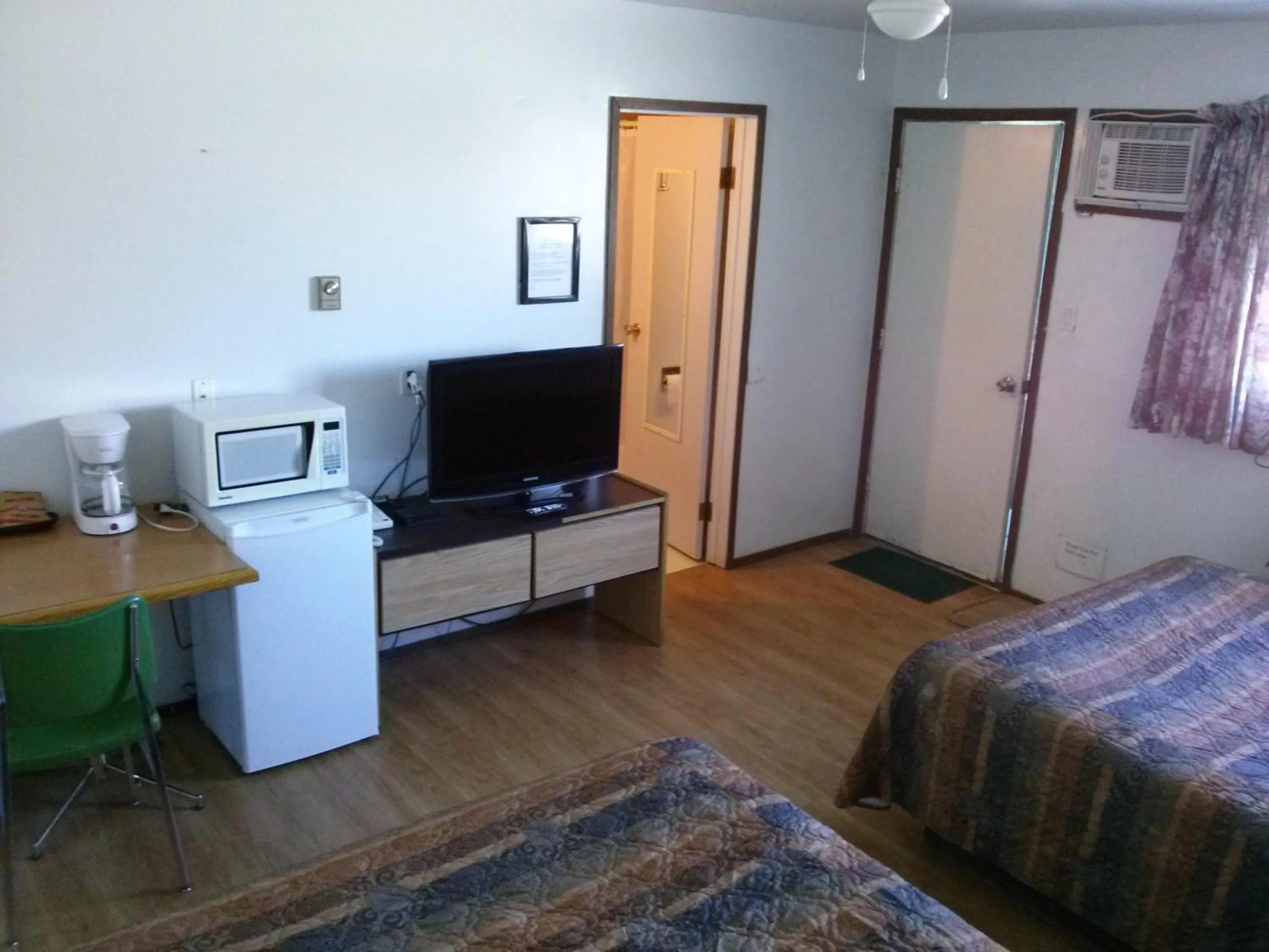 Bed in Moosomin Motel