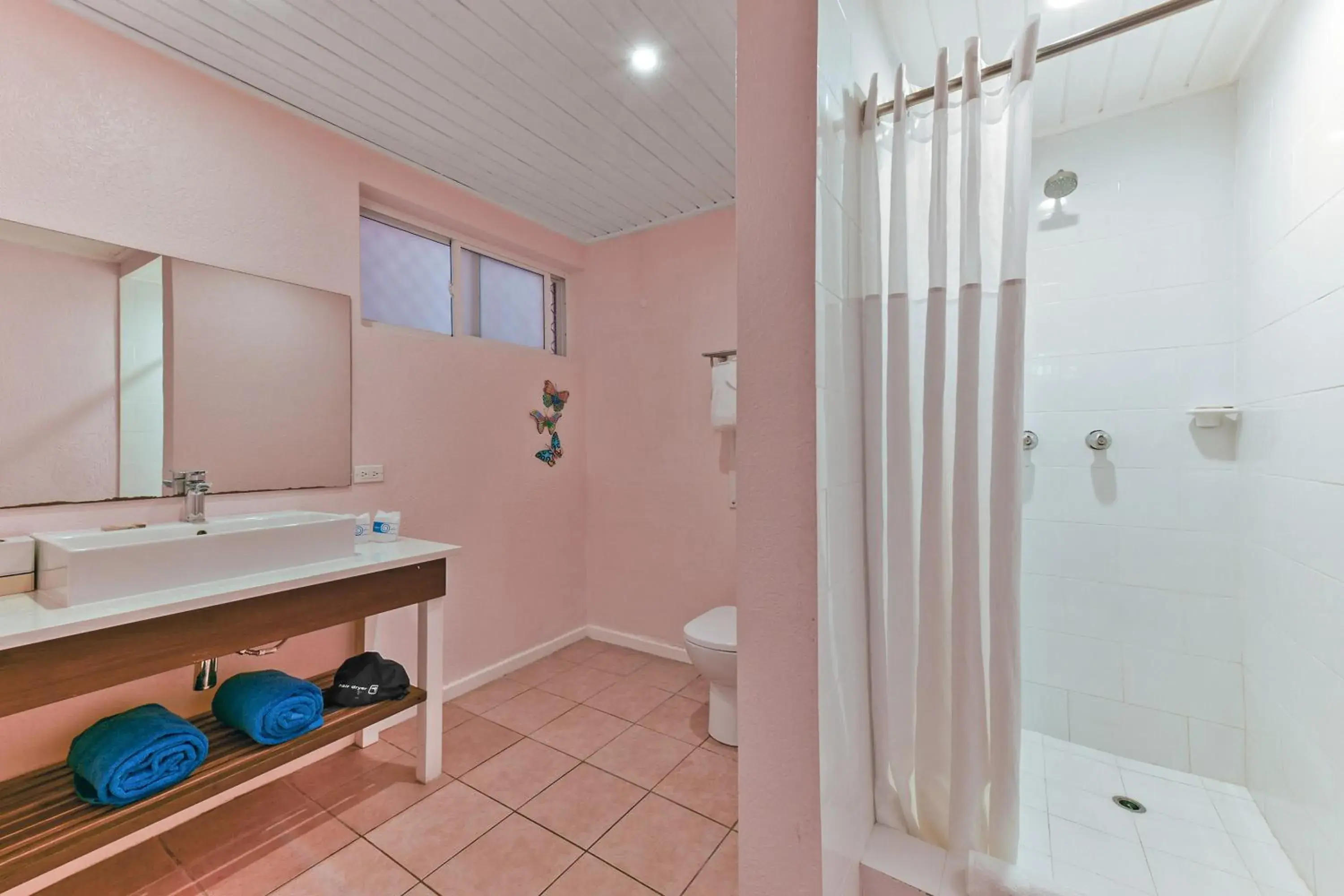 Bathroom in Butterfly Beach Hotel Bathroom in Butterfly Beach Hotel