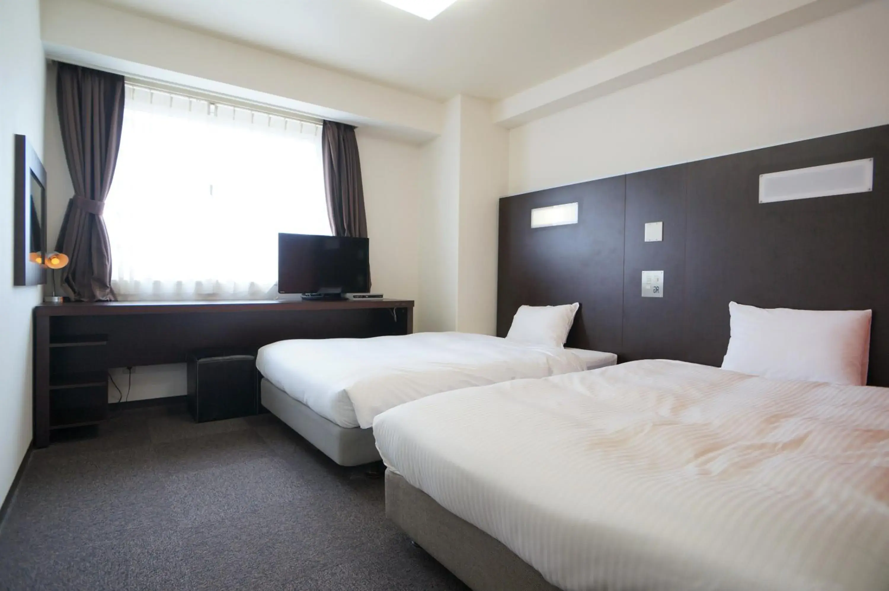 Twin Room - single occupancy - Non-Smoking in Green Rich Hotel Suizenji Twin Room - single occupancy - Non-Smoking in Green Rich Hotel Suizenji