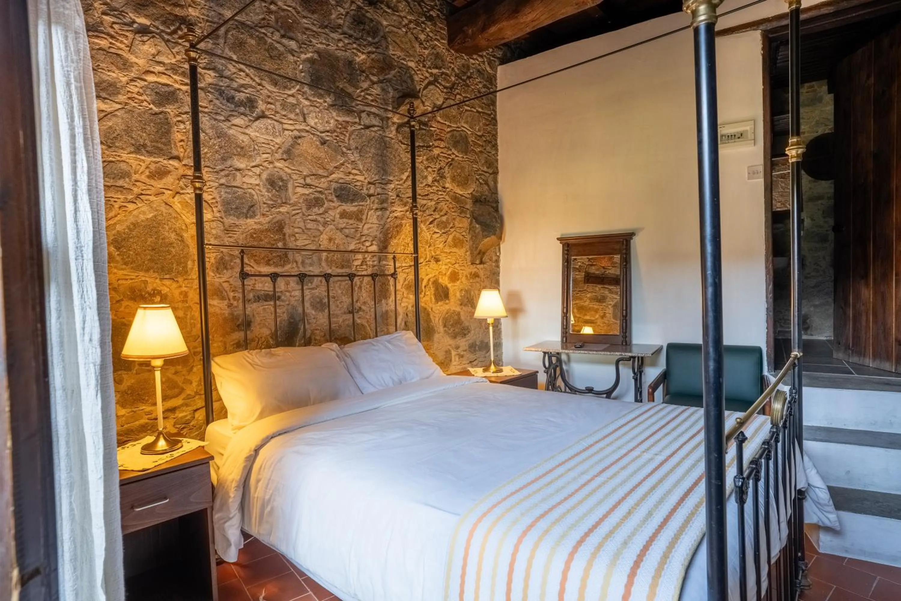 Bed in Ambelikos Traditional Agrohotel