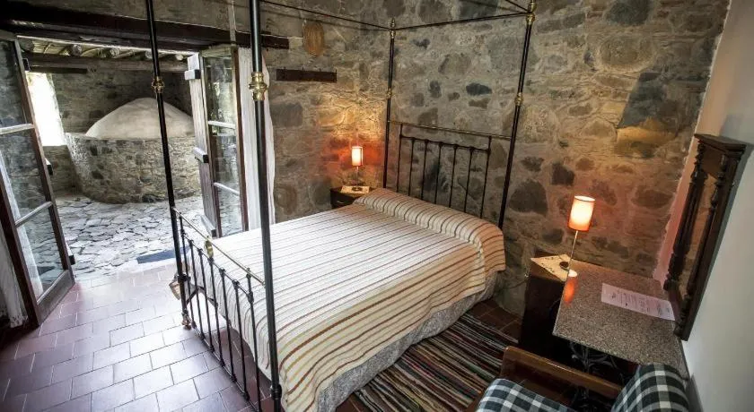 Bed in Ambelikos Traditional Agrohotel