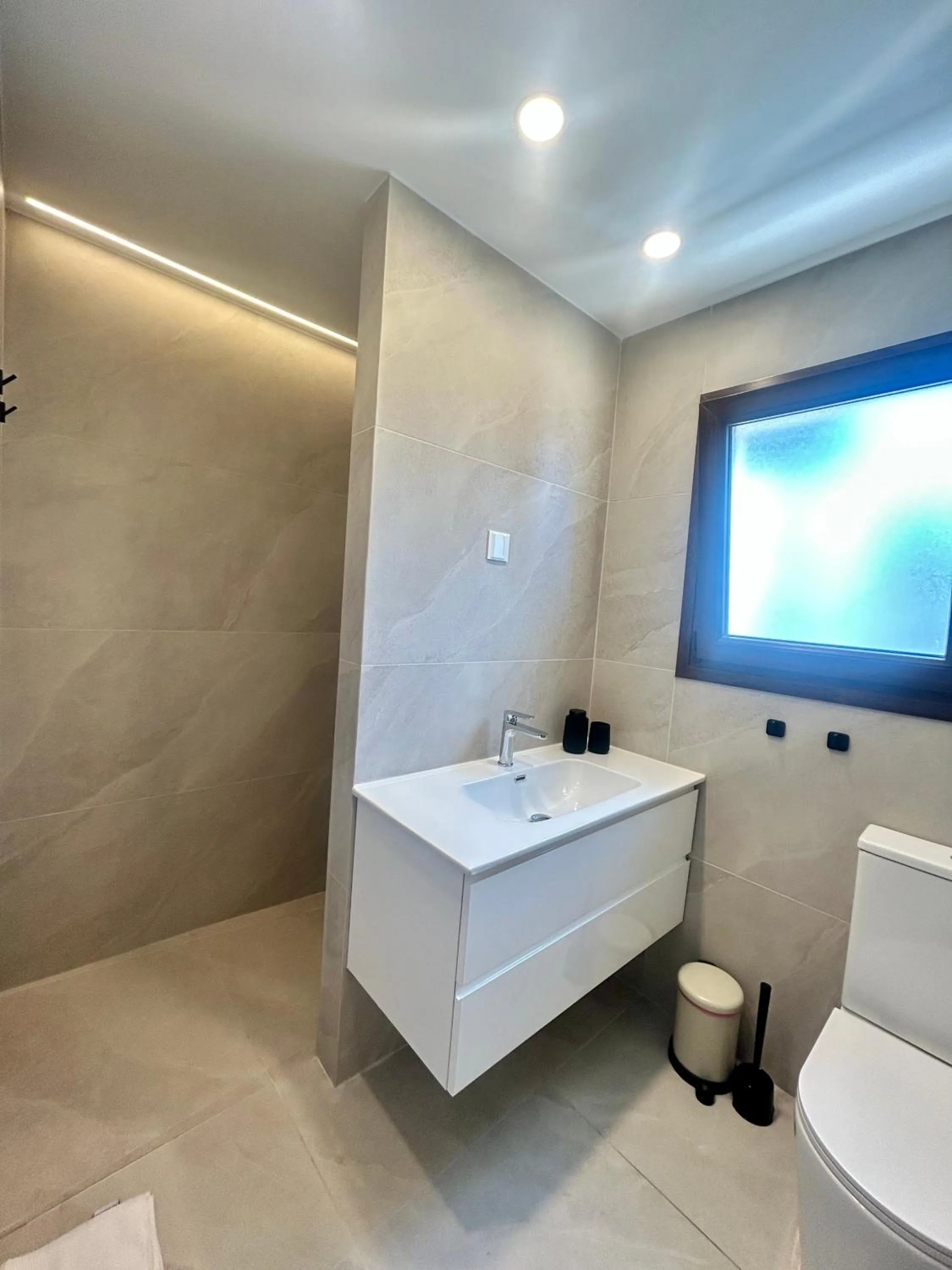 Toilet in Pigeon Beach Hotel Apartments