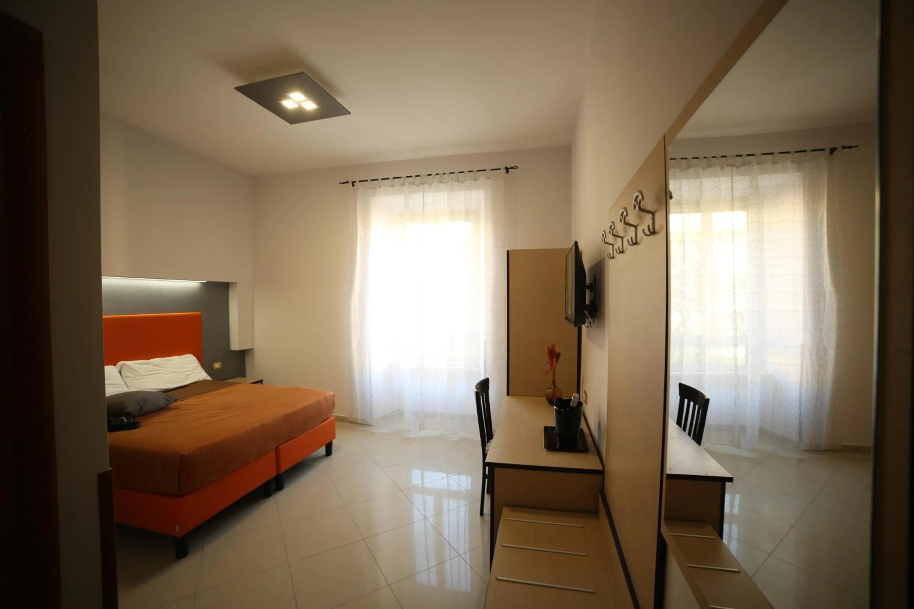 Photo of the whole room, Bed in All Seasons
