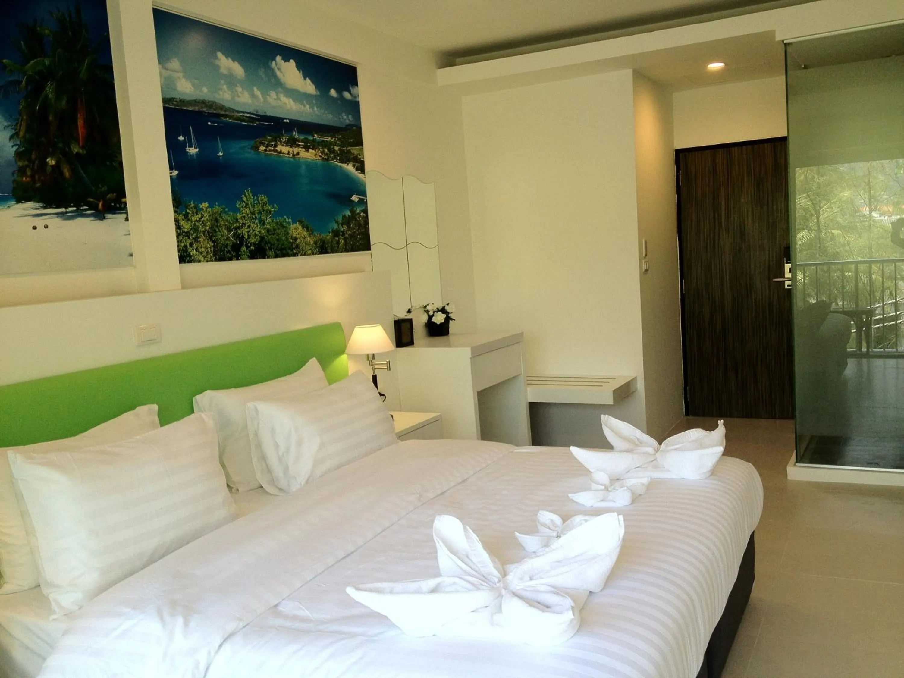 Bed in Armoni Patong Beach Hotel