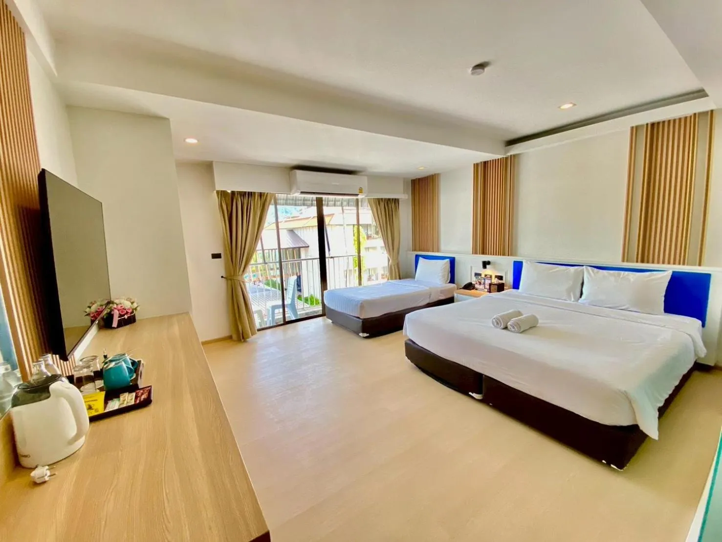 Bed in Armoni Patong Beach Hotel