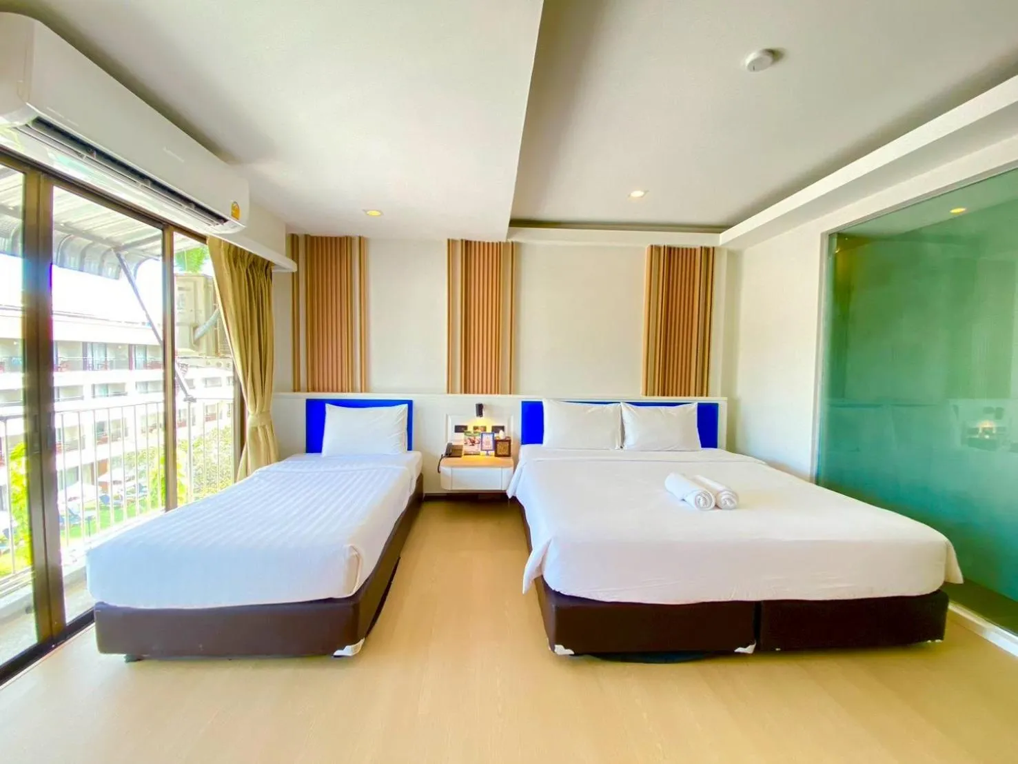 Bed in Armoni Patong Beach Hotel