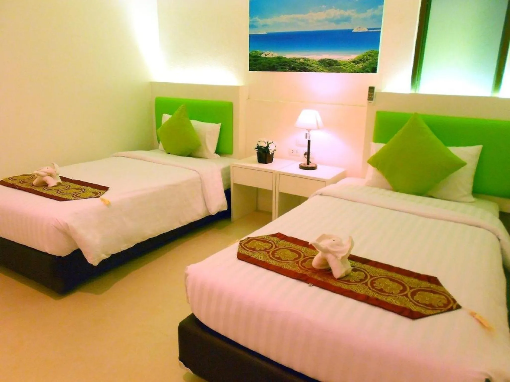 Bed in Armoni Patong Beach Hotel