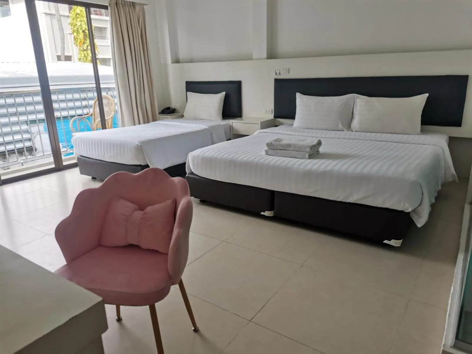 Bed in Armoni Patong Beach Hotel