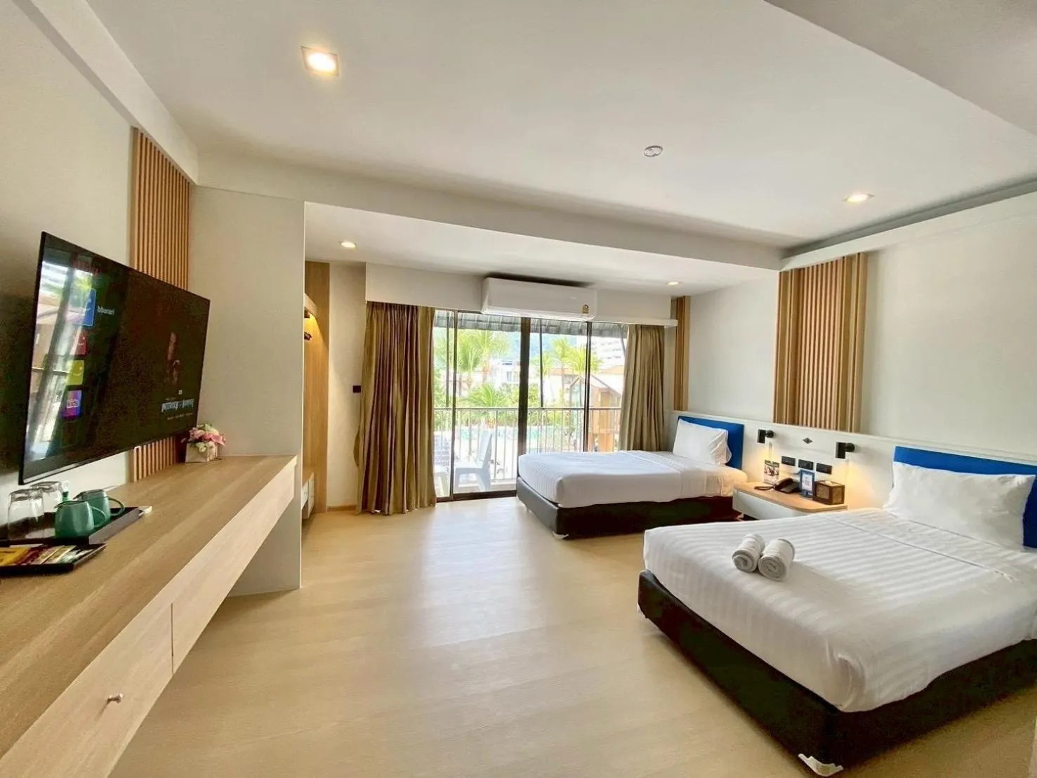 Photo of the whole room, Bed in Citin Armoni Patong Hotel by Compass Hospitality - Newly Renovated