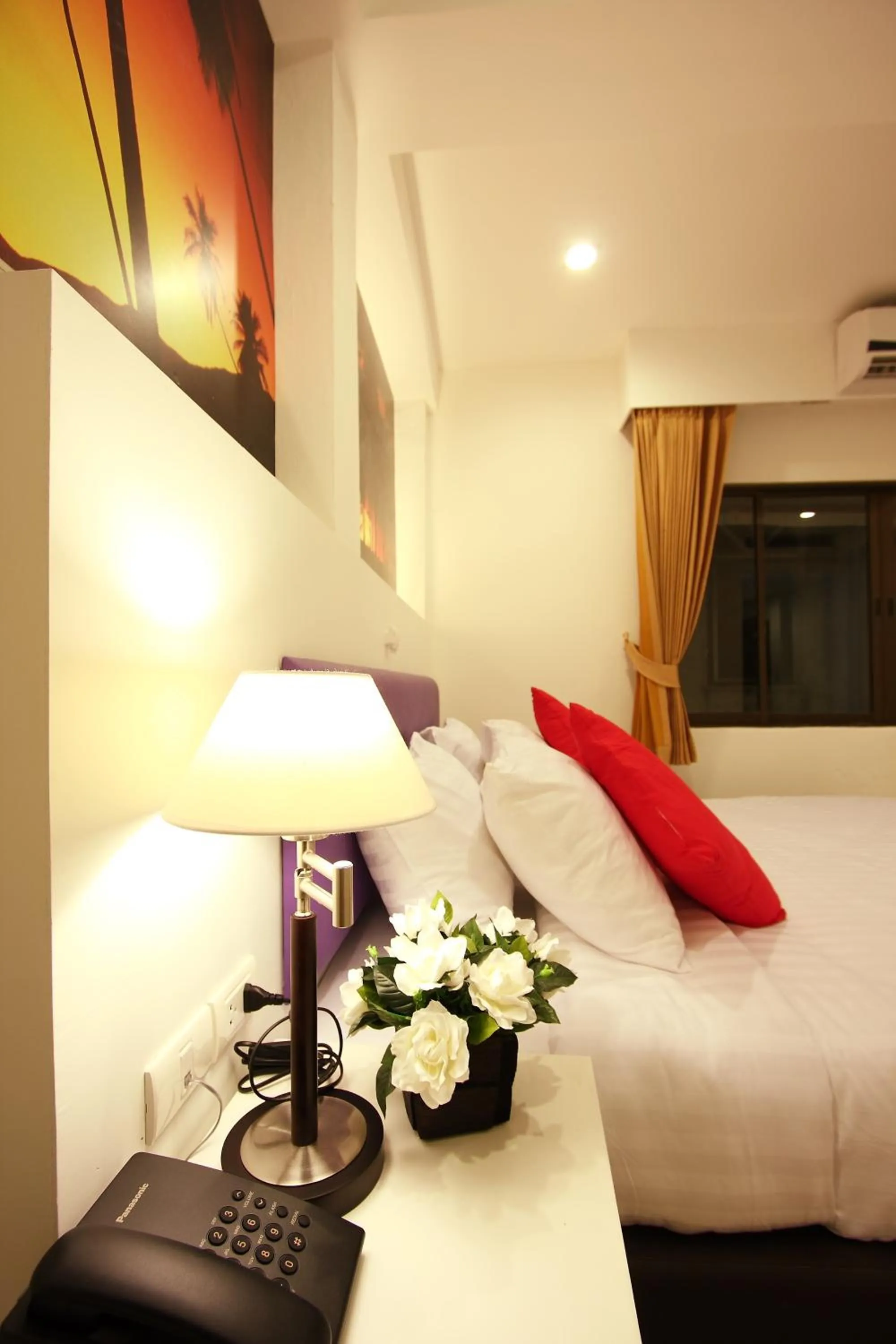 Bed in Armoni Patong Beach Hotel