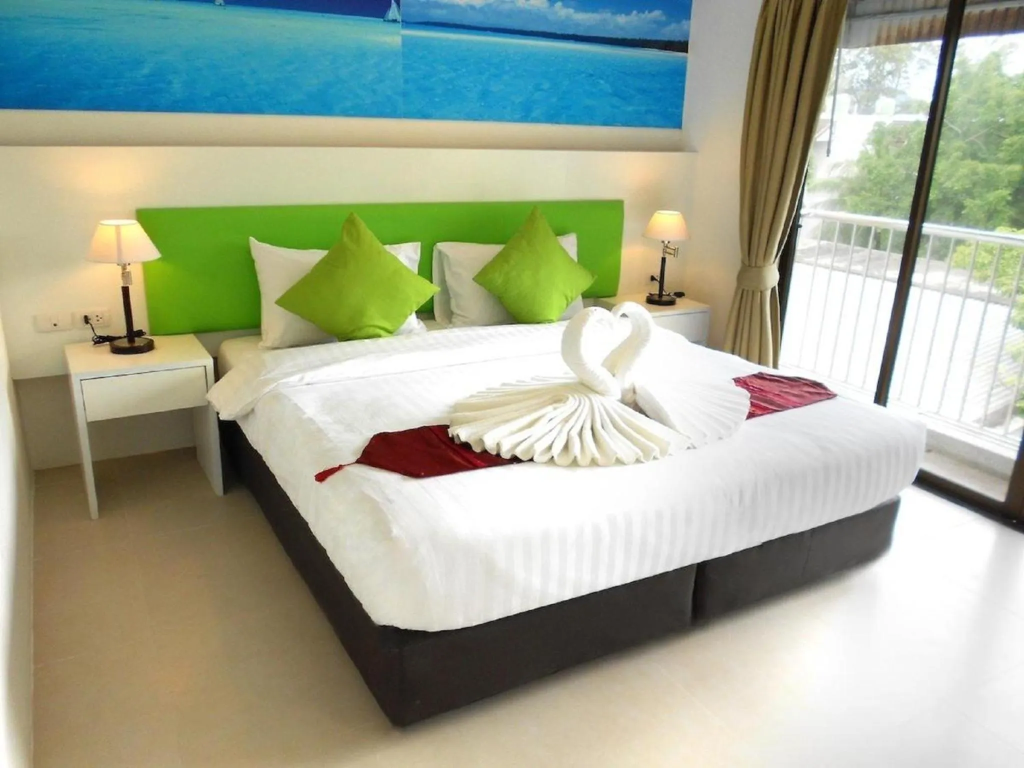 Bed in Armoni Patong Beach Hotel