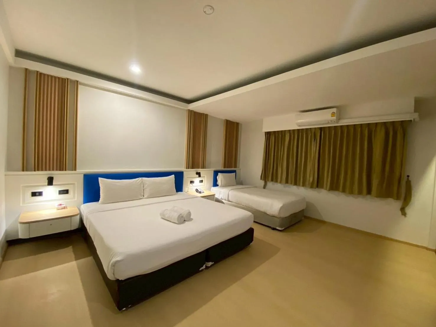 Bed in Armoni Patong Beach Hotel
