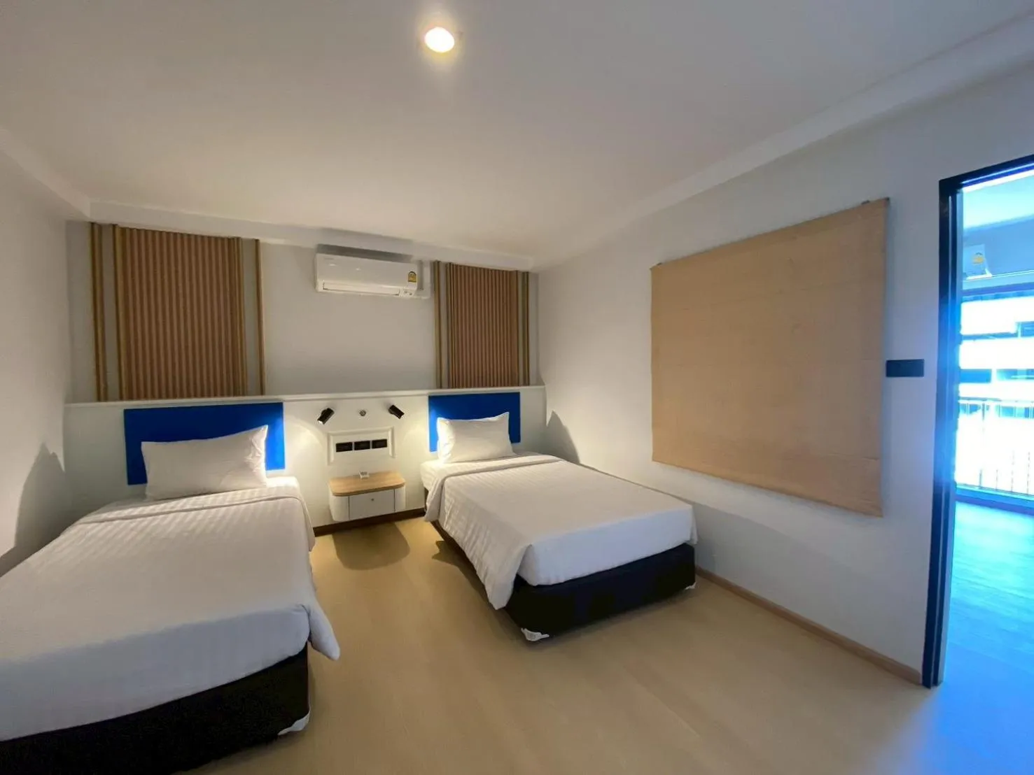 Bed in Armoni Patong Beach Hotel
