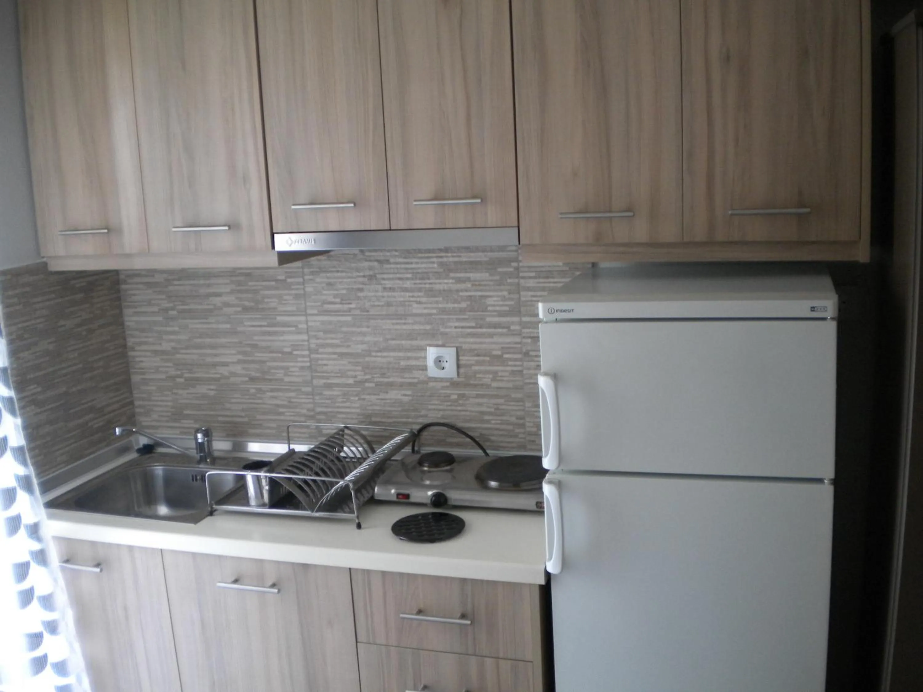 Kitchen or kitchenette in Nostos Apartments