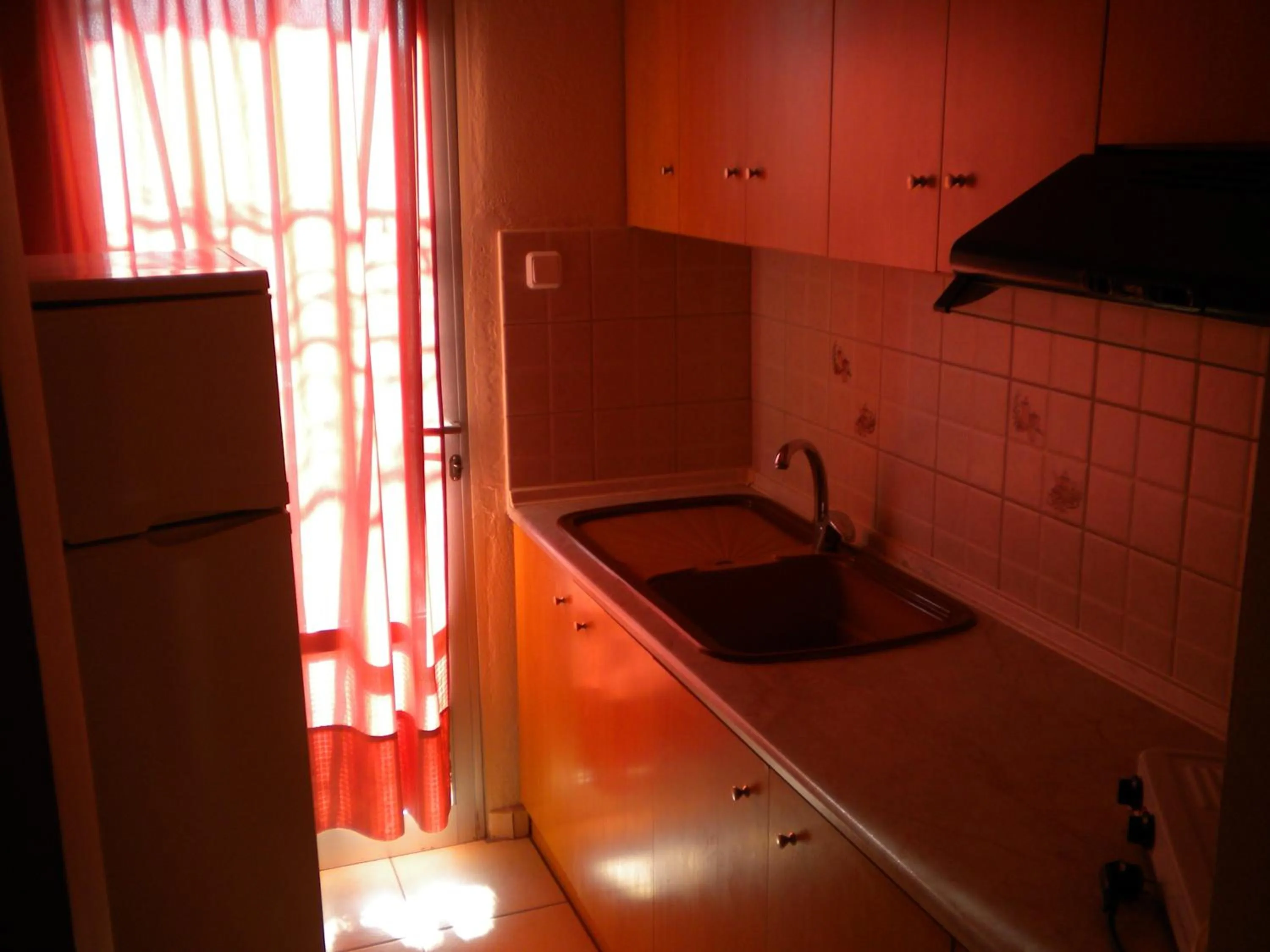 Kitchen or kitchenette in Nostos Apartments