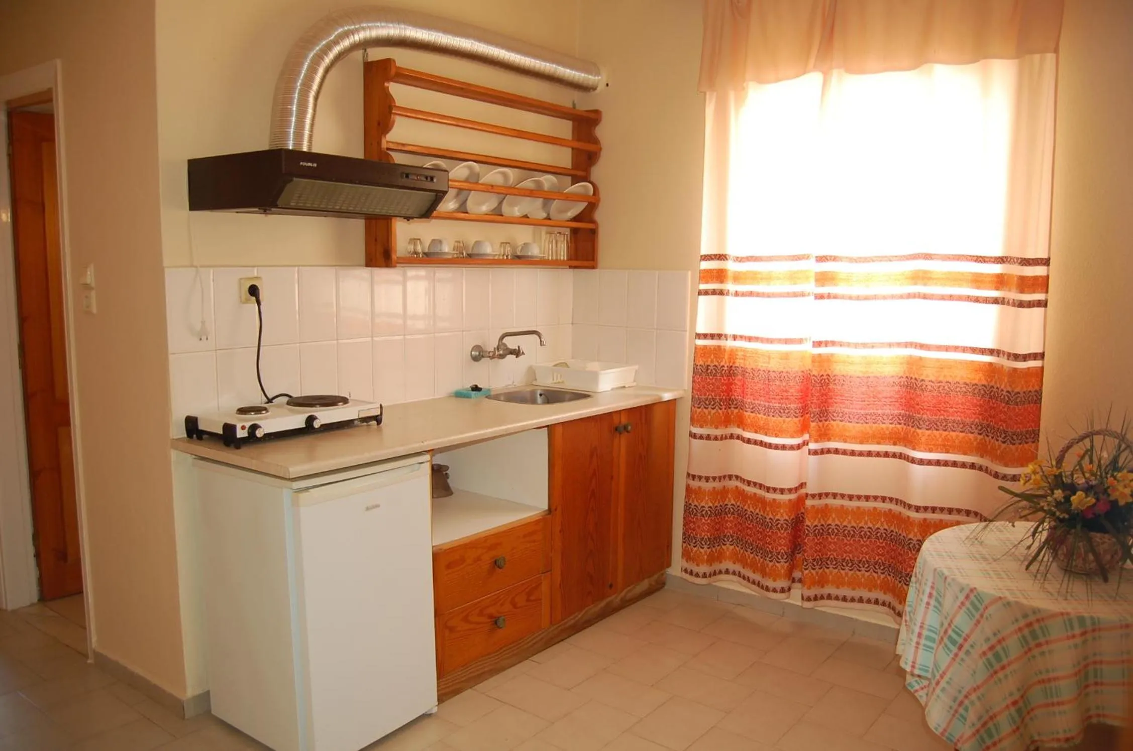 Kitchen or kitchenette in Haris Apartments