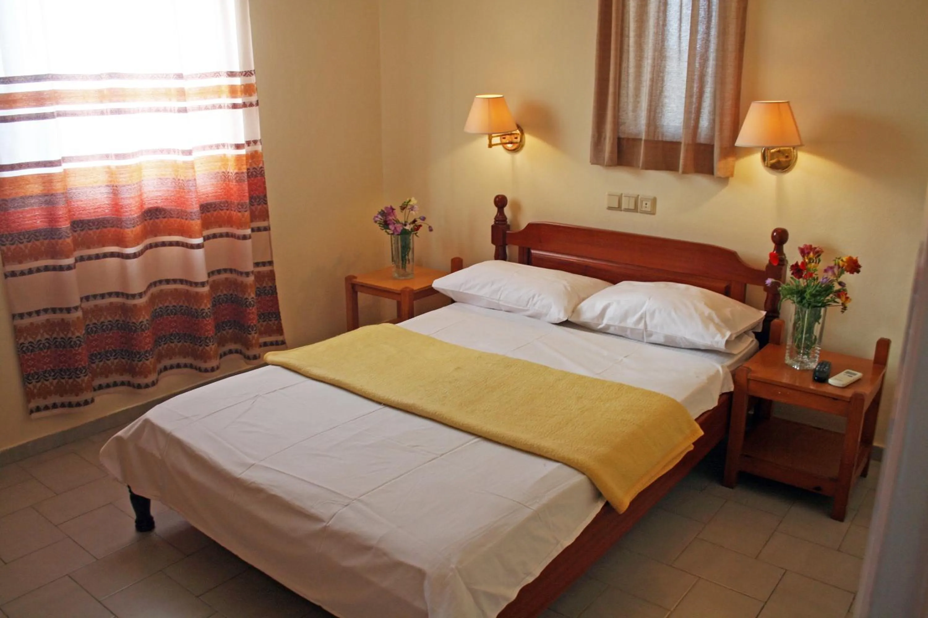 Bedroom in Haris Apartments