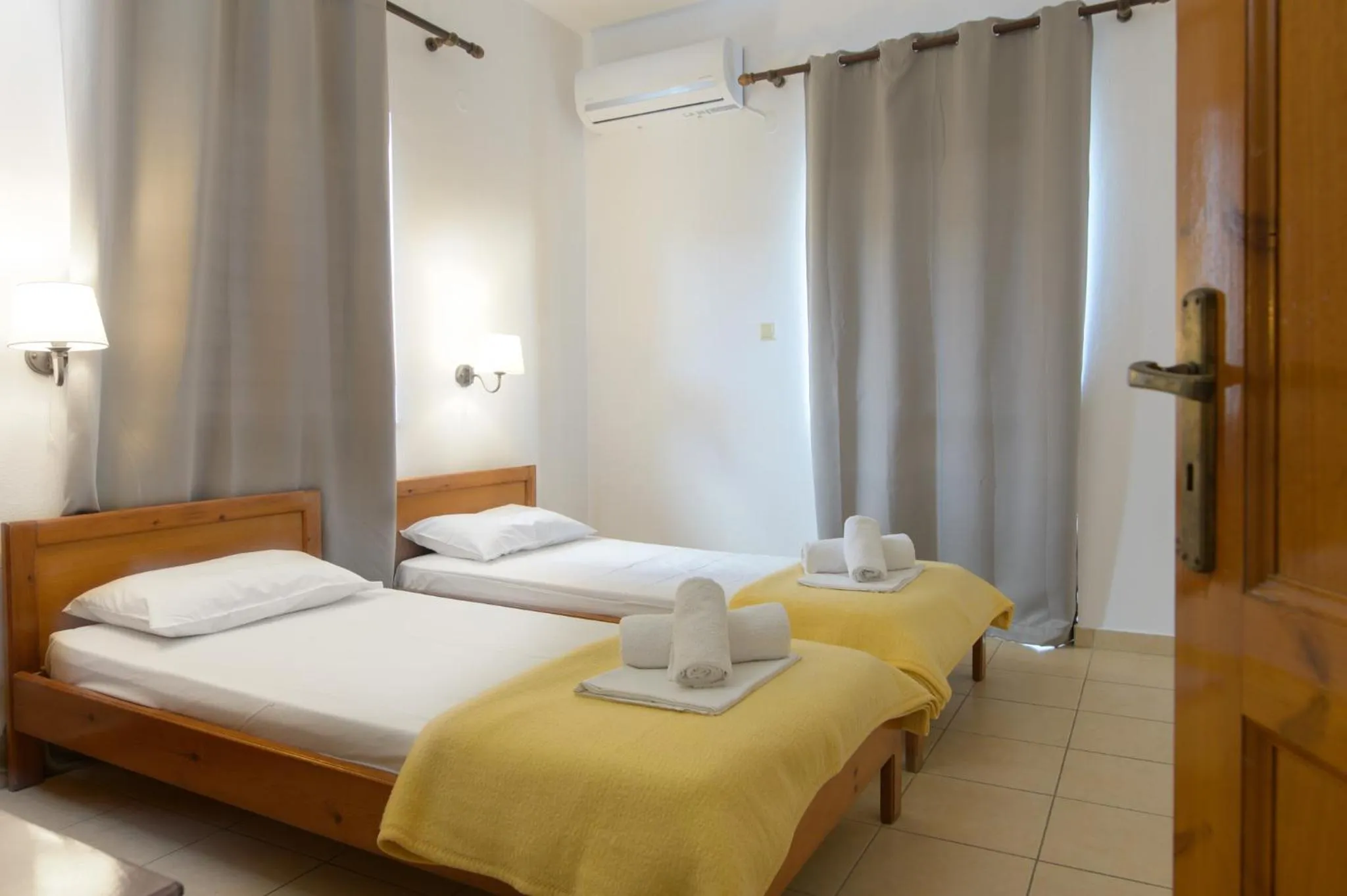 Bed in Haris Apartments