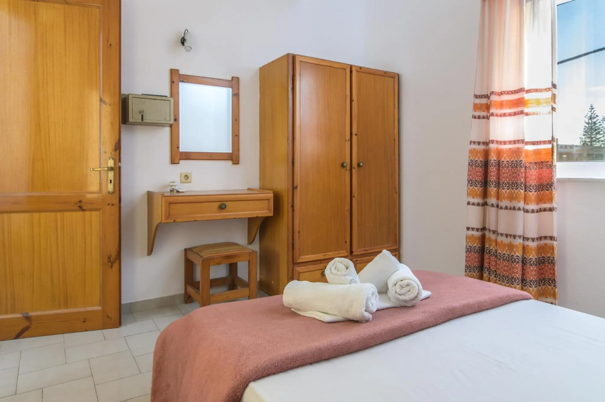 Bedroom in Haris Apartments