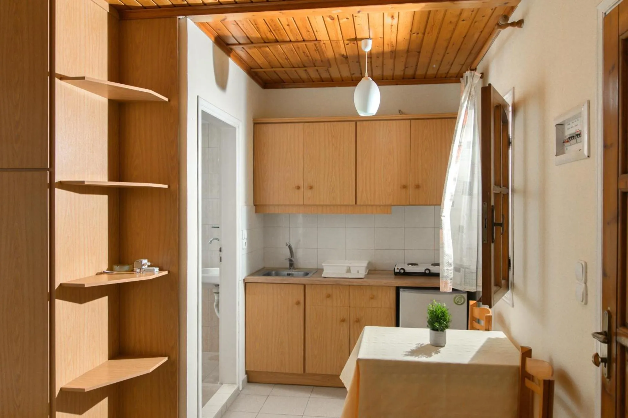 Kitchen or kitchenette in Haris Apartments
