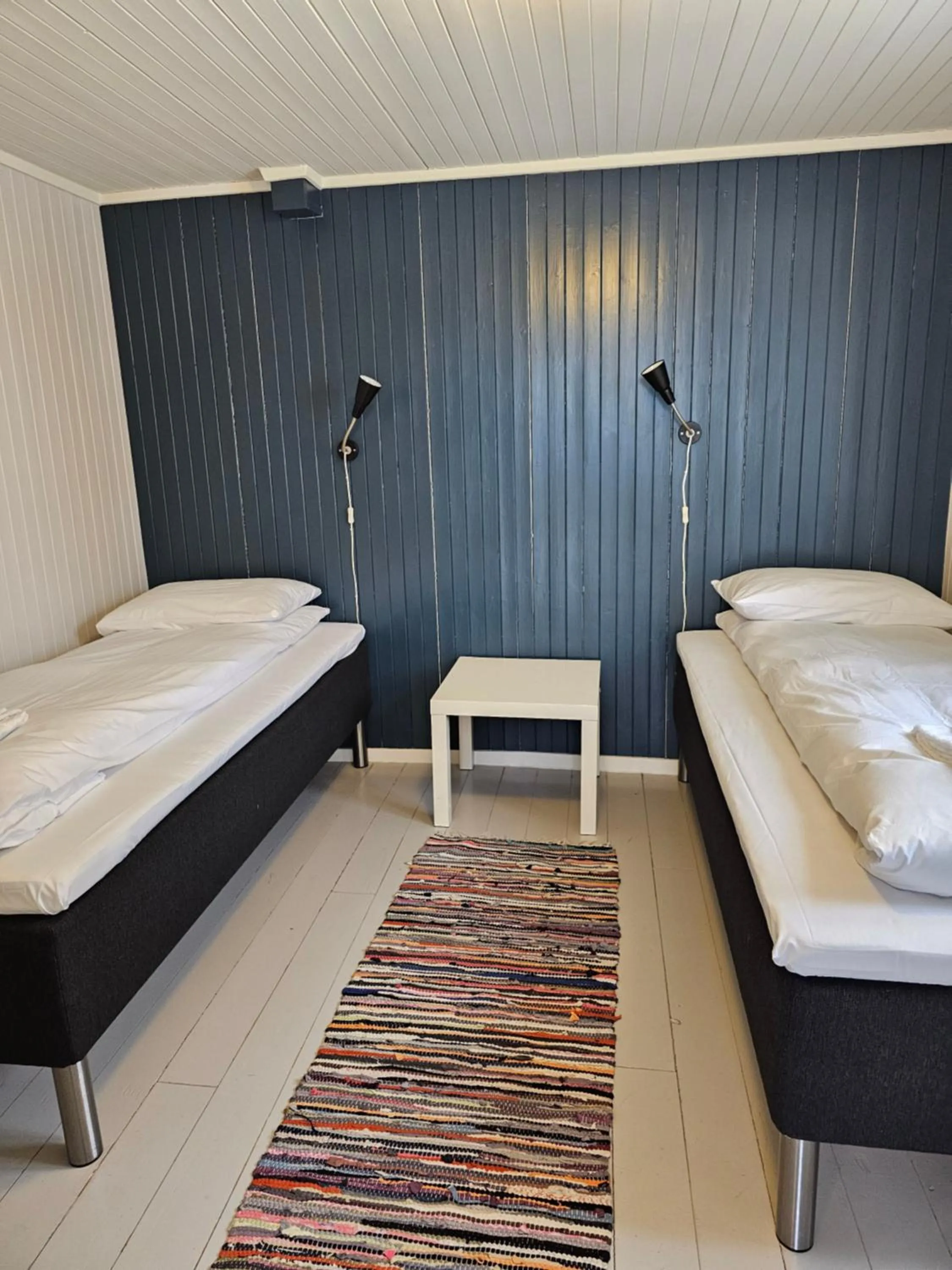 Bed in Å Rorbuer - by Classic Norway Hotels