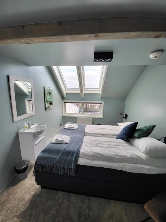 Bedroom, Bed in Å Rorbuer - by Classic Norway Hotels