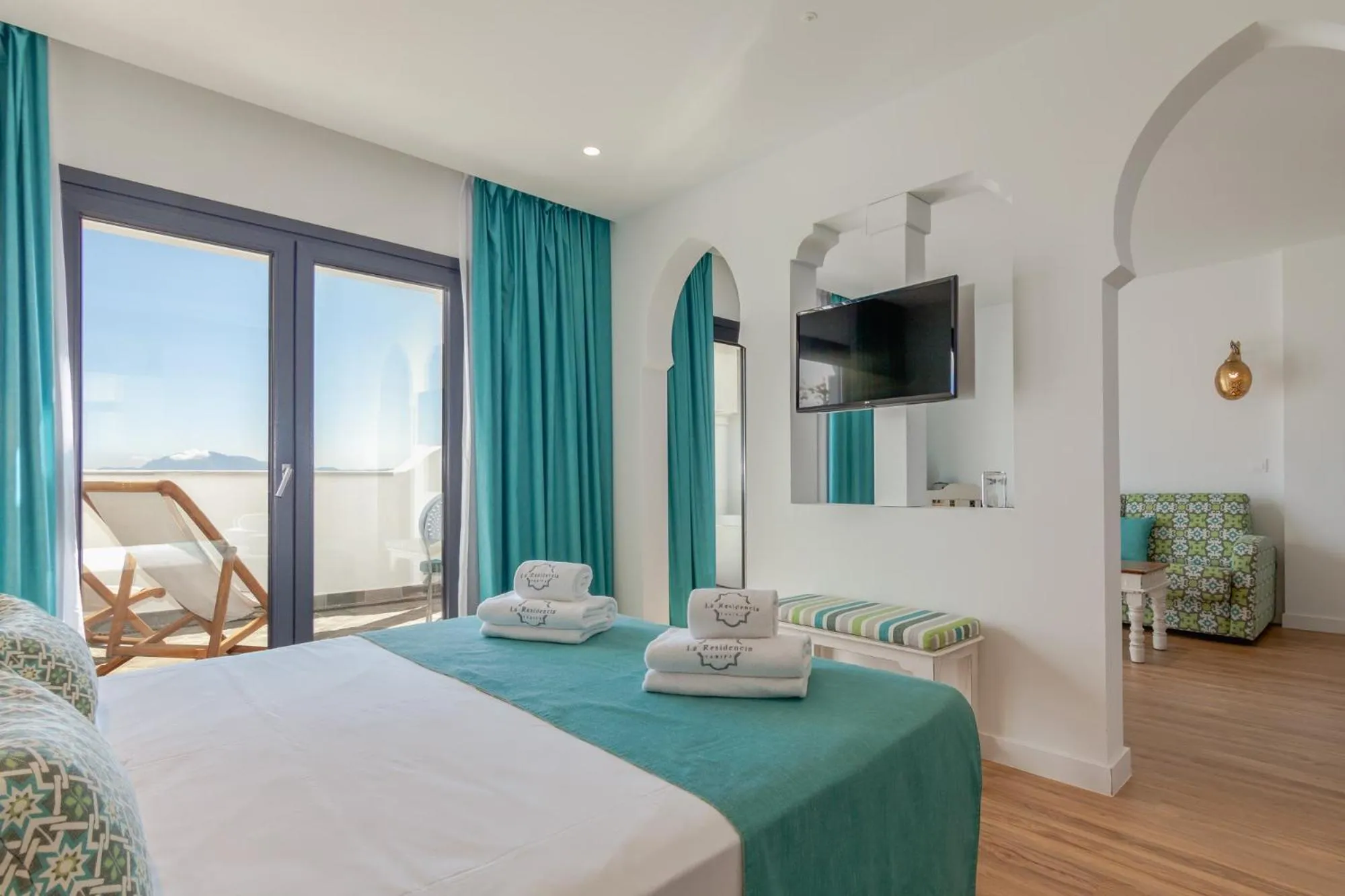 Communal lounge/ TV room, Bed in La Residencia Puerto Hotel & Spa