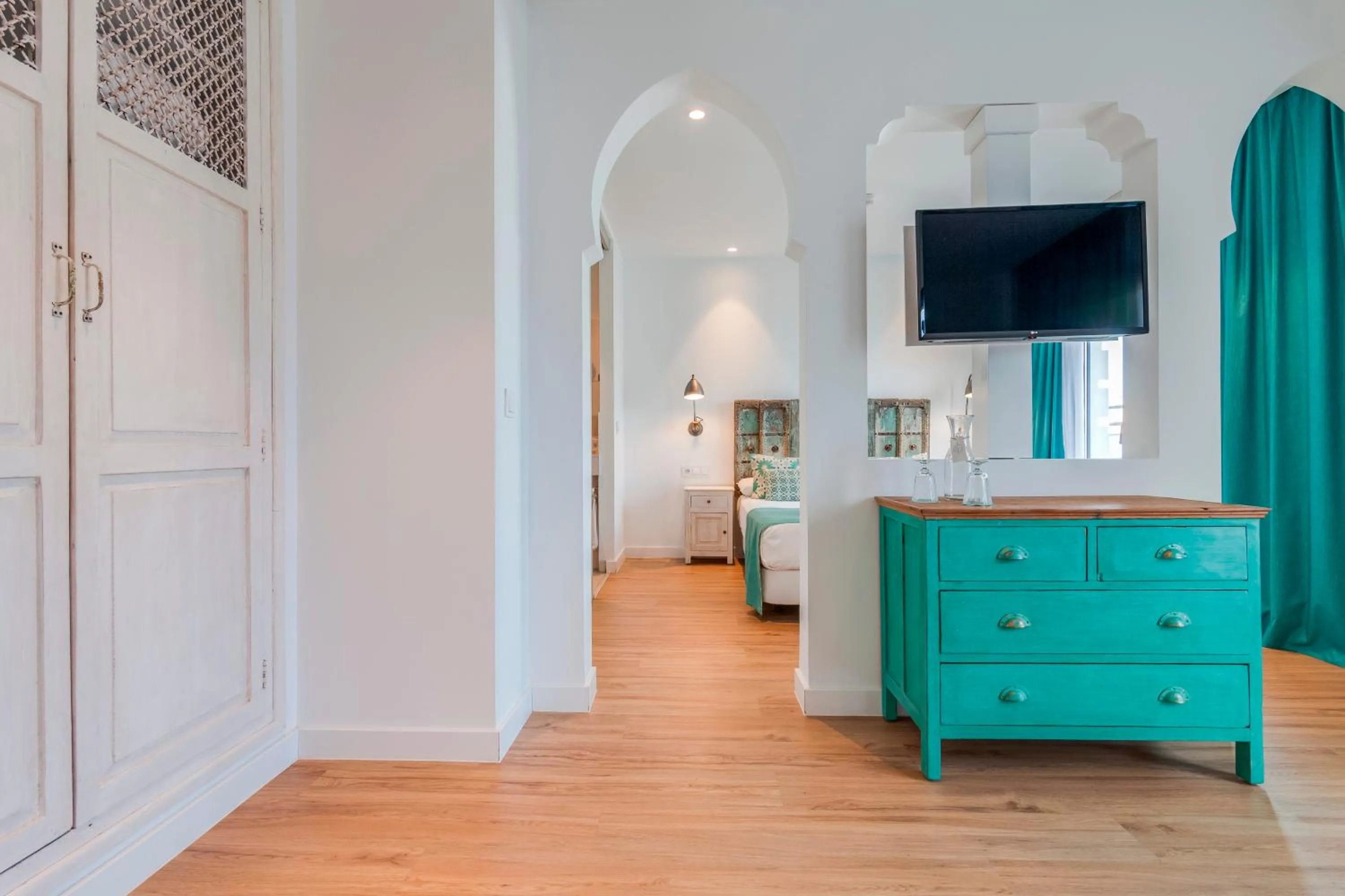 Communal lounge/ TV room, Bed in La Residencia Puerto Hotel & Spa