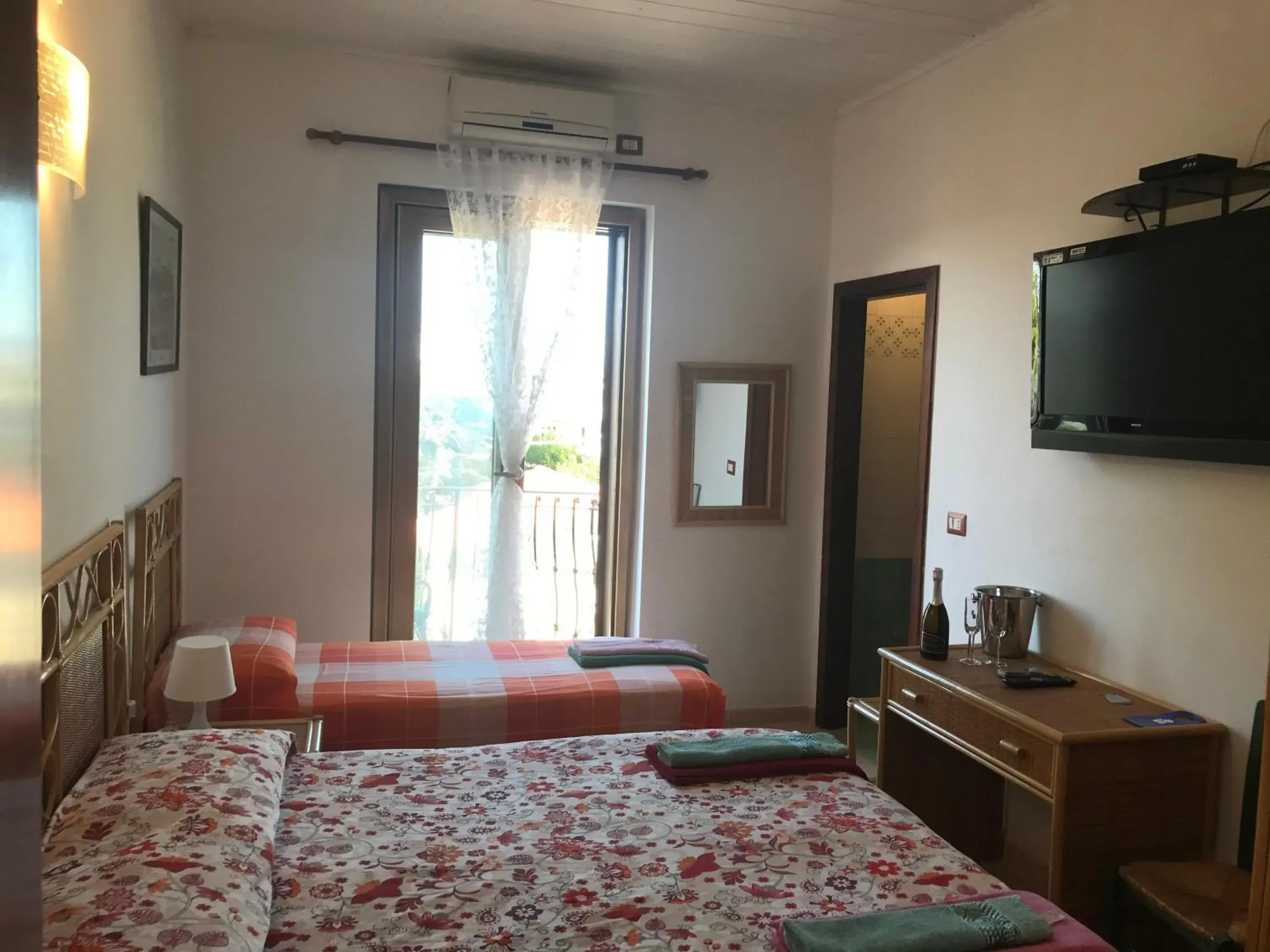 Triple Room with Balcony in Casa Elvira Triple Room with Balcony in Casa Elvira