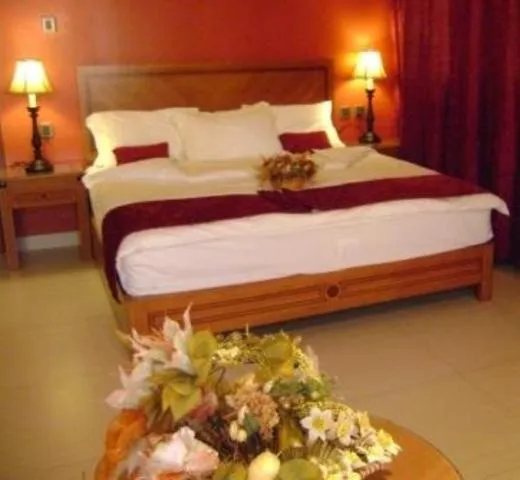 Bed in La Rosa Hotel Oman