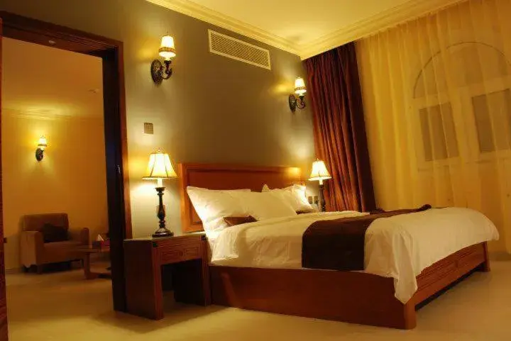 Bed in La Rosa Hotel Oman Bed in La Rosa Hotel Oman