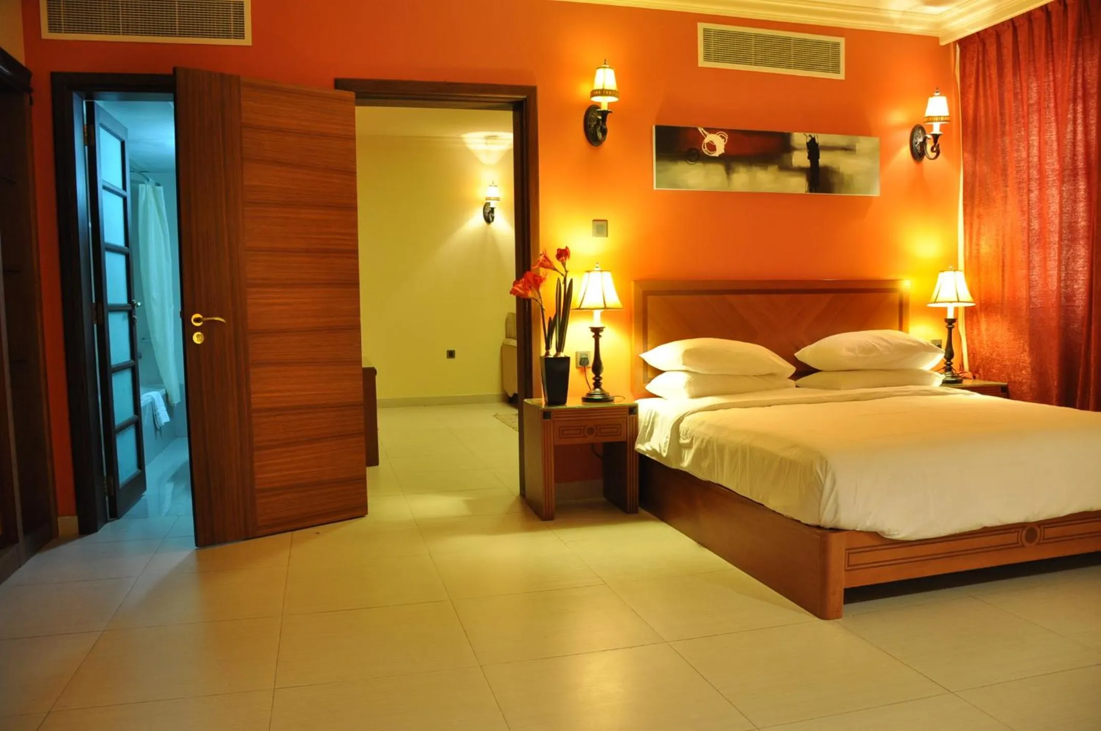 Bed in La Rosa Hotel Oman