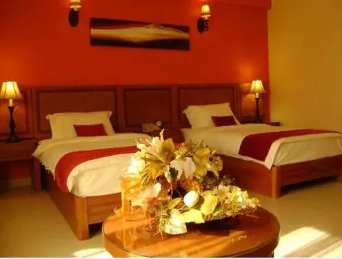 Bed in La Rosa Hotel Oman Bed in La Rosa Hotel Oman