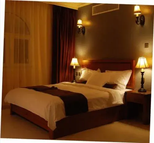 Bed in La Rosa Hotel Oman Bed in La Rosa Hotel Oman