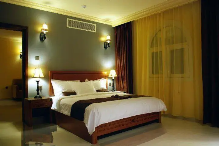 Bed in La Rosa Hotel Oman Bed in La Rosa Hotel Oman