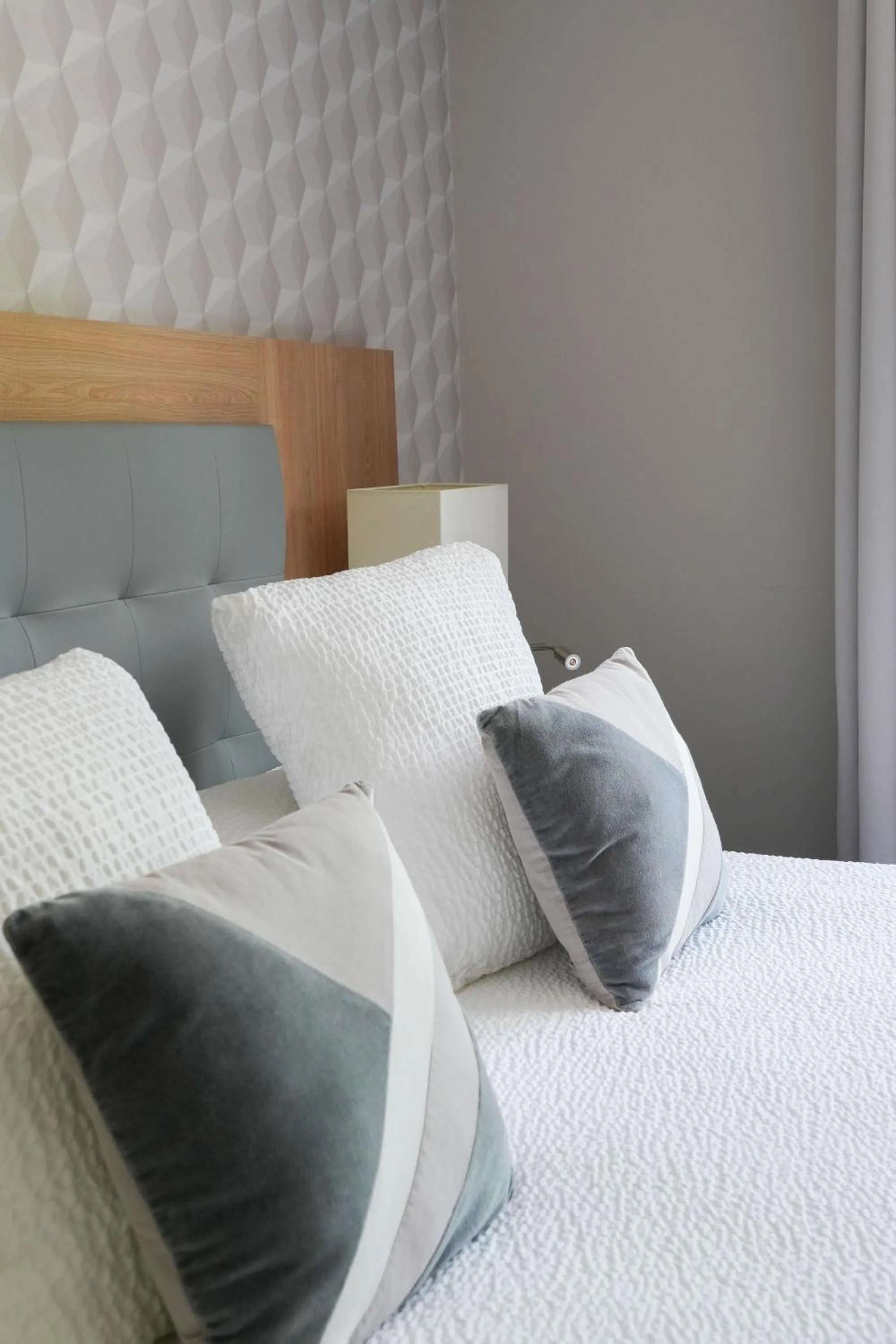 Bed in Logis Hôtel l'Amandier