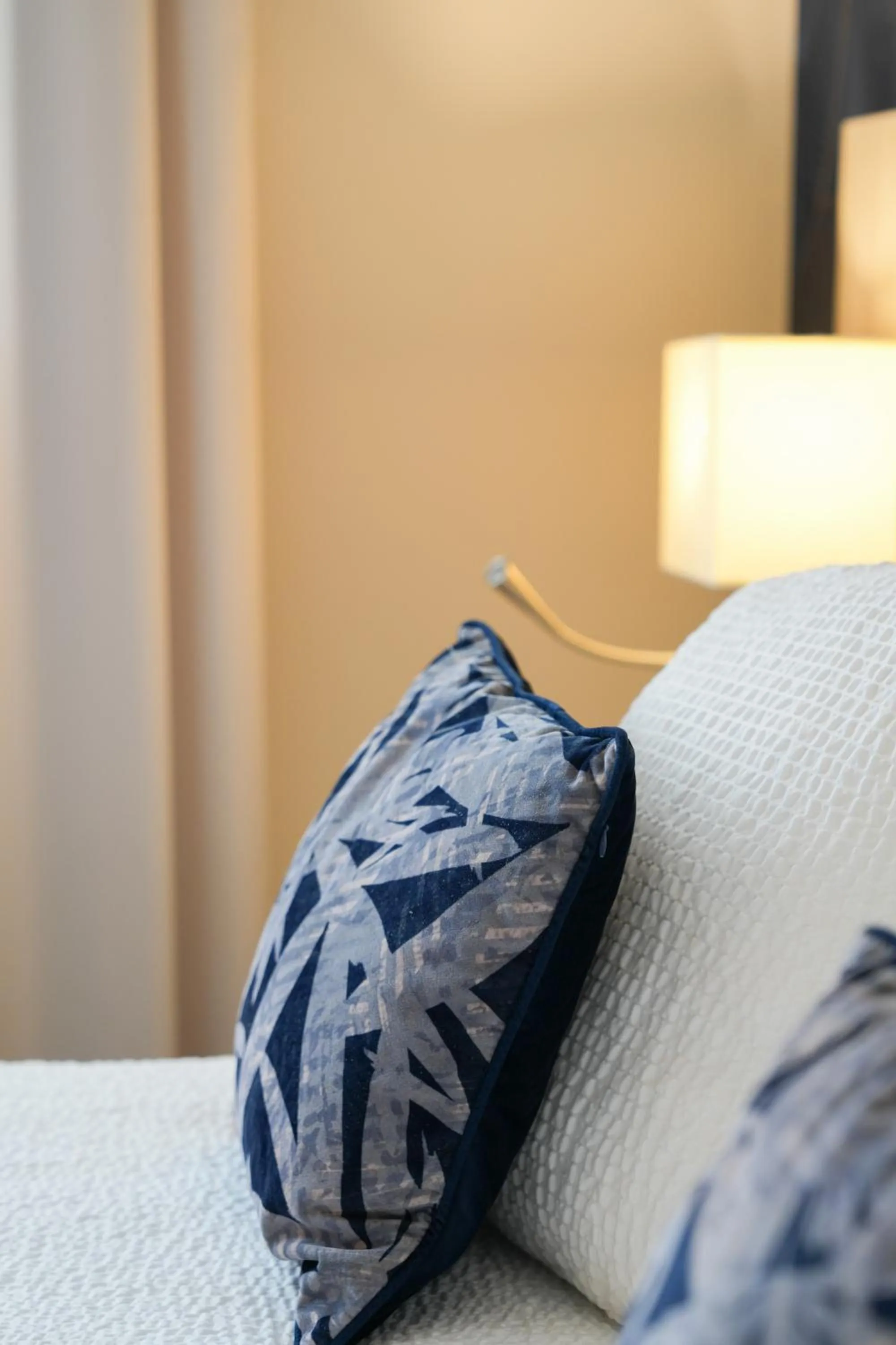 Bed in Logis Hôtel l'Amandier