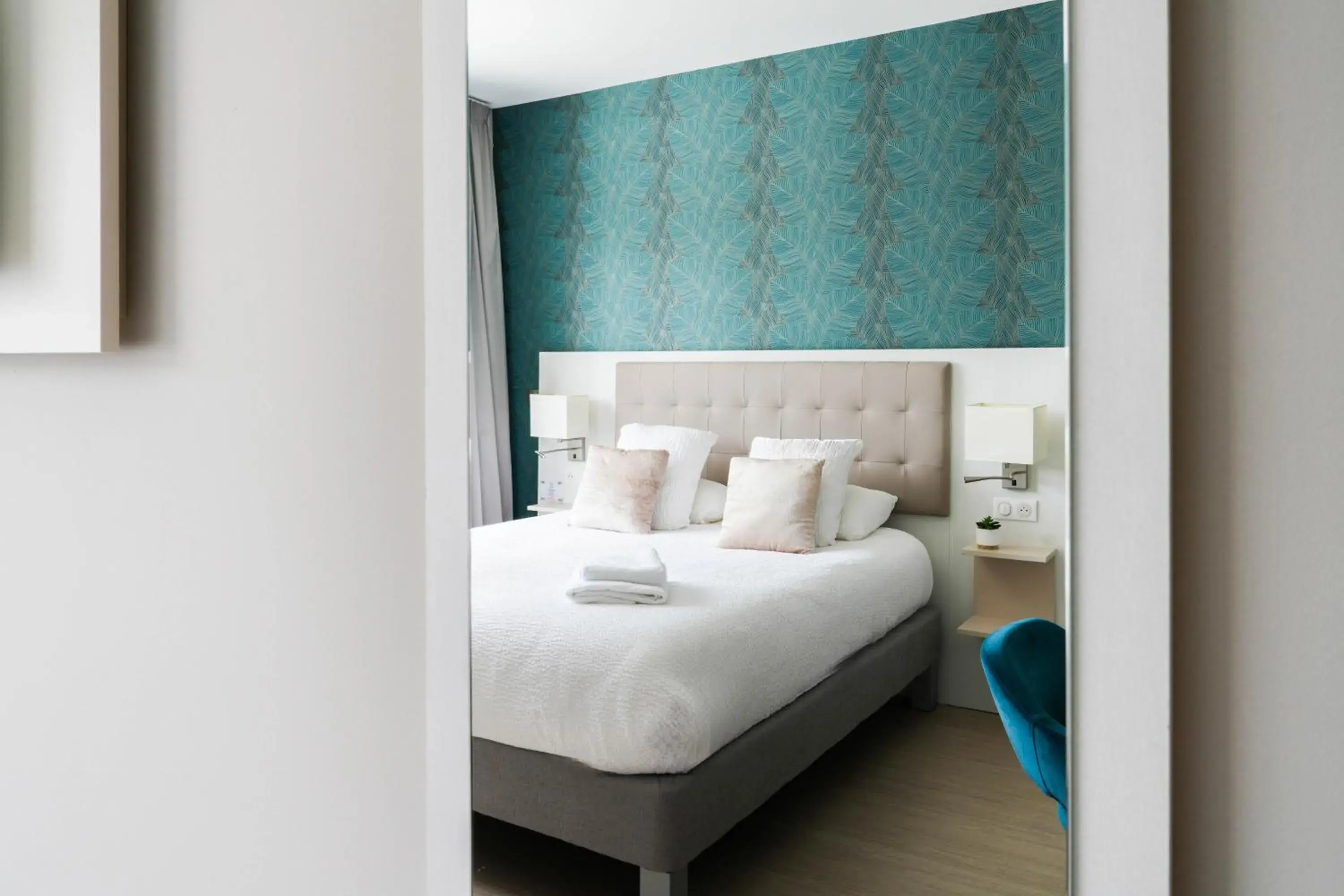 Bed in Logis Hôtel l'Amandier Bed in Logis Hôtel l'Amandier