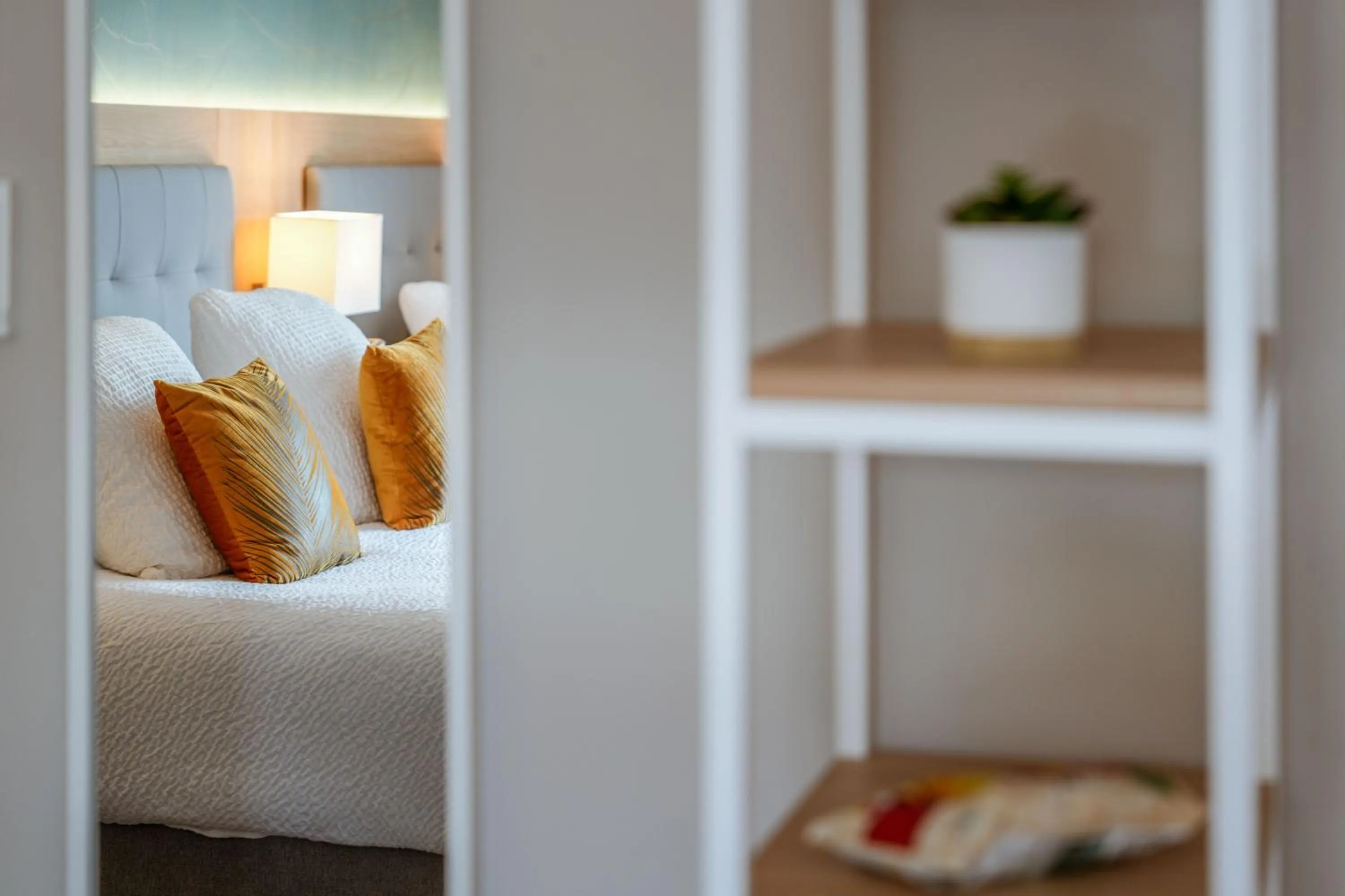 Bed in Logis Hôtel l'Amandier